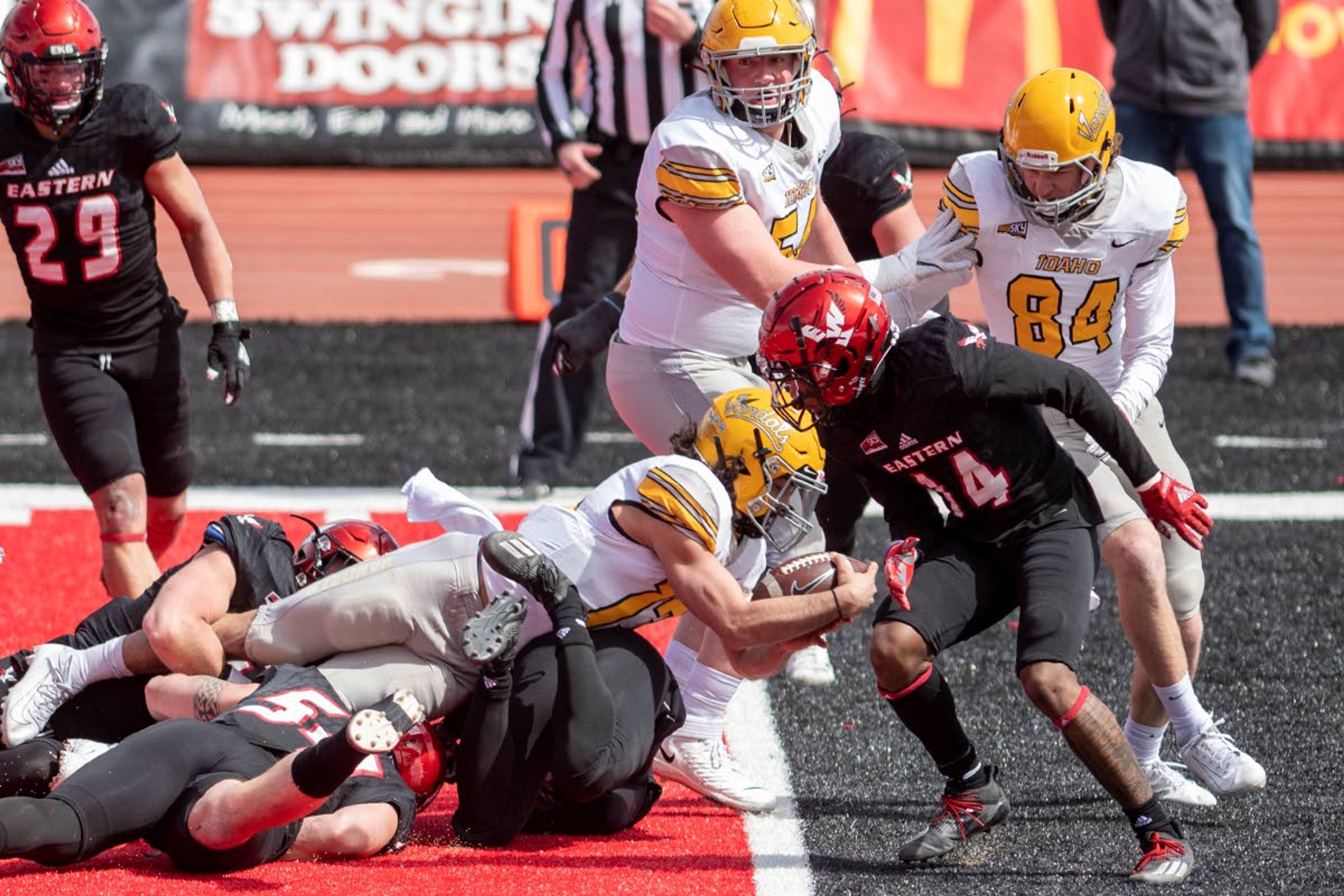 Idaho quarterback Zach Borisch dives into the end zone for a touchdown during the first quarter of a Big Sky Conference game against Eastern Washington at Roos Field in Cheney, Wash. Borisch ran for 205 yards, the most by a Vandal in 14 years.