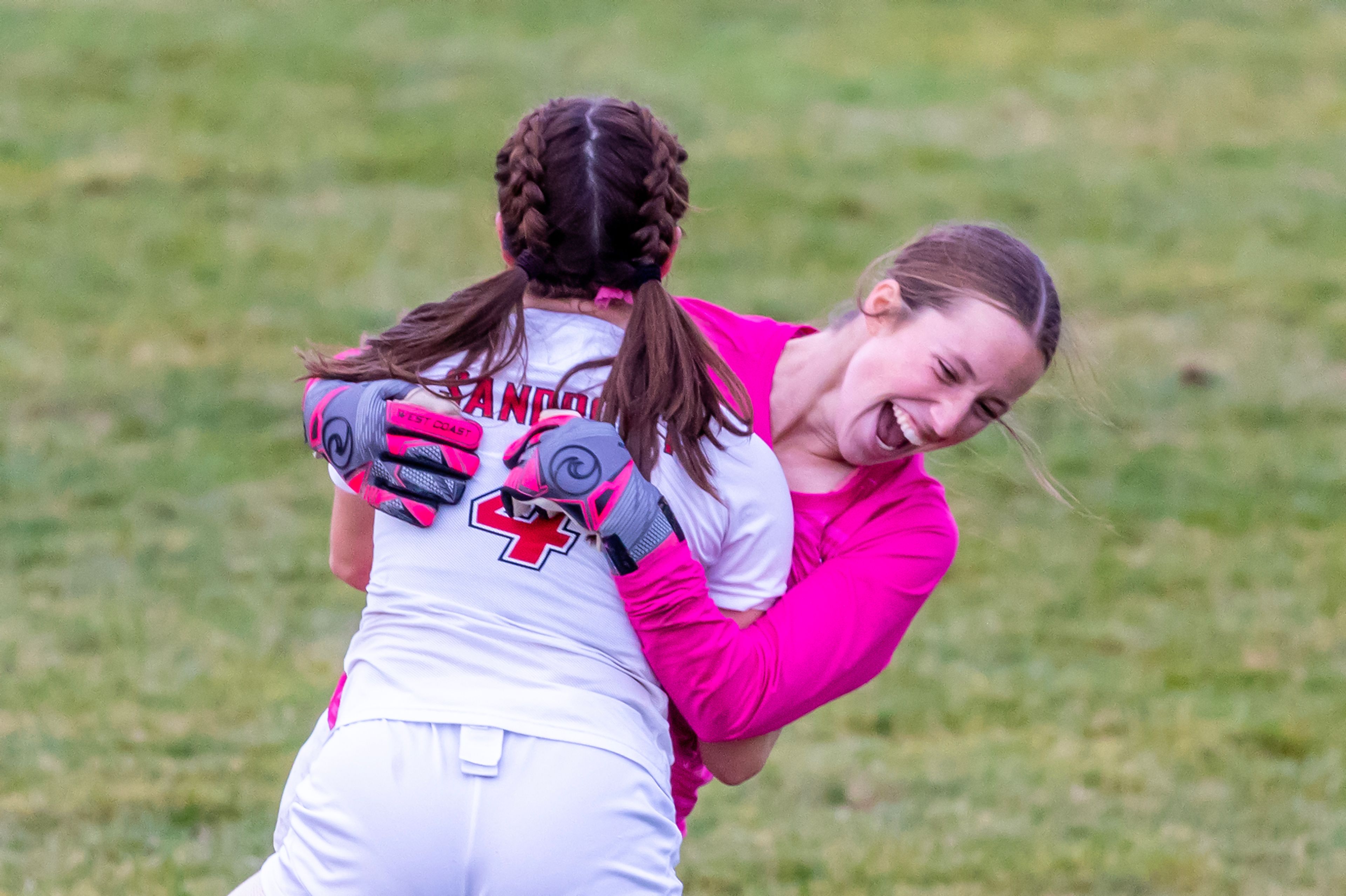 Sandpoint goalkeeper Lilliana Brinkmeier celebrates with teammate Maddie Mitchell in the 5A Inland Empire League District Championship Wednesday at Walker Field in Lewiston.,