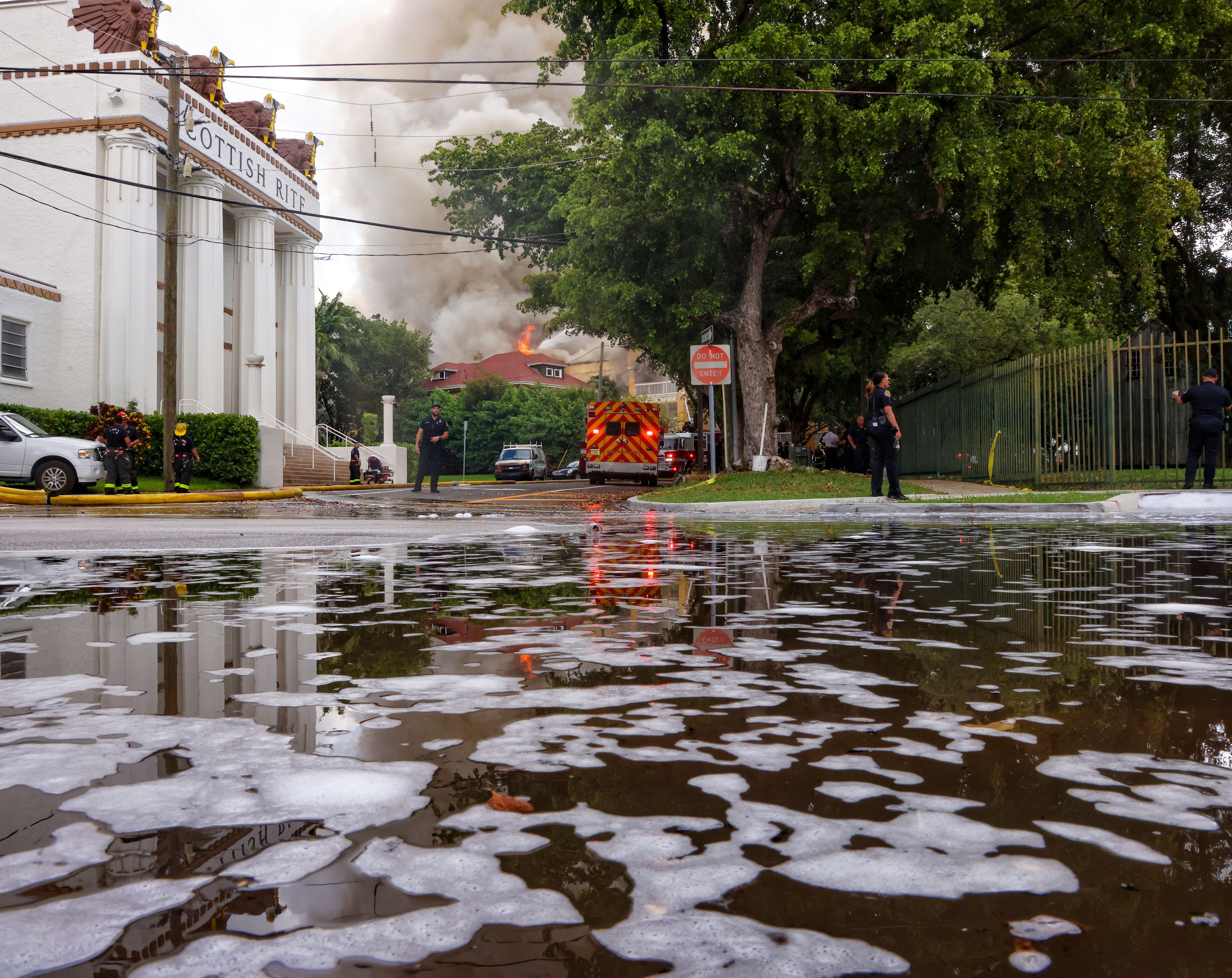 Miami Fire Rescue and Miami police work at the scene of the fire at the Temple Court Apartments, Monday, June 10, 2024 in Miami.