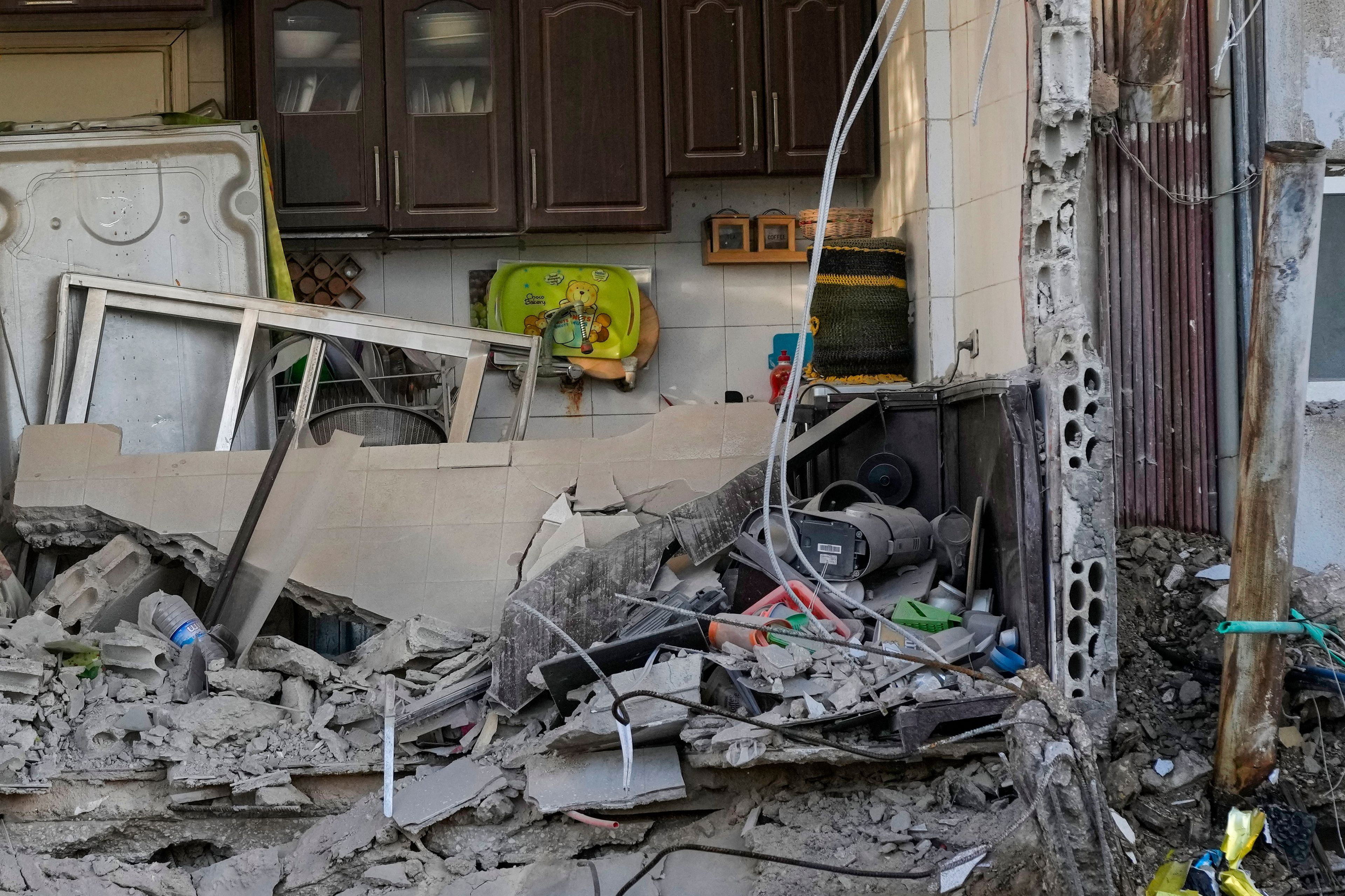 A destroyed apartment is seen in ruins at the site of an Israeli airstrike in Dahiyeh, Beirut, Lebanon, Monday, Oct. 21, 2024. (AP Photo/Hassan Ammar)