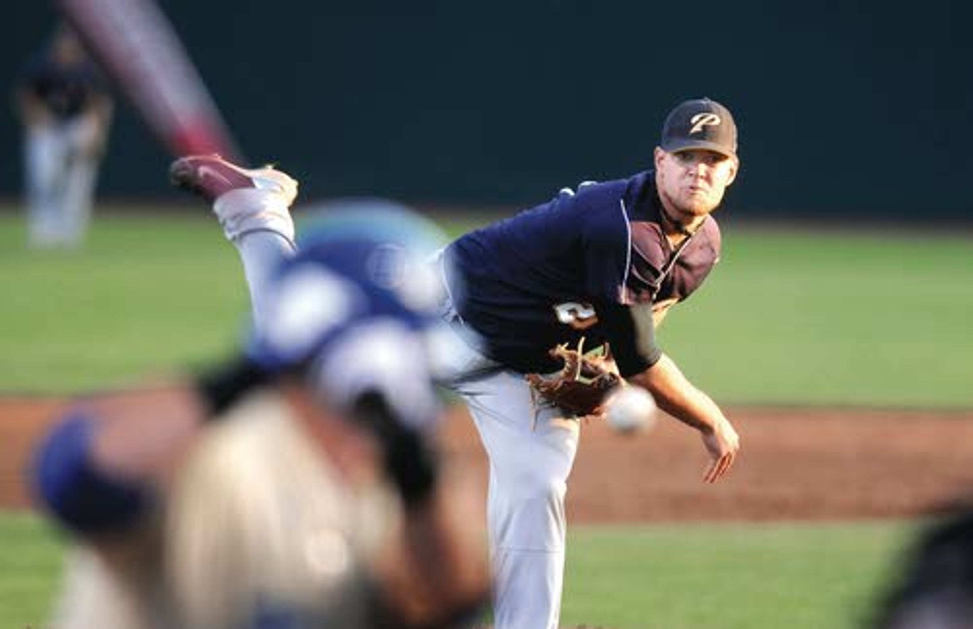 LSU Shreveport’s Jared Mortensen rockets a pitch for a strike during the sixth inning. Mortensen went the distance, allowing three runs on seven hits as the Pilots stayed alive with a 7-3 win over the Bulldogs.