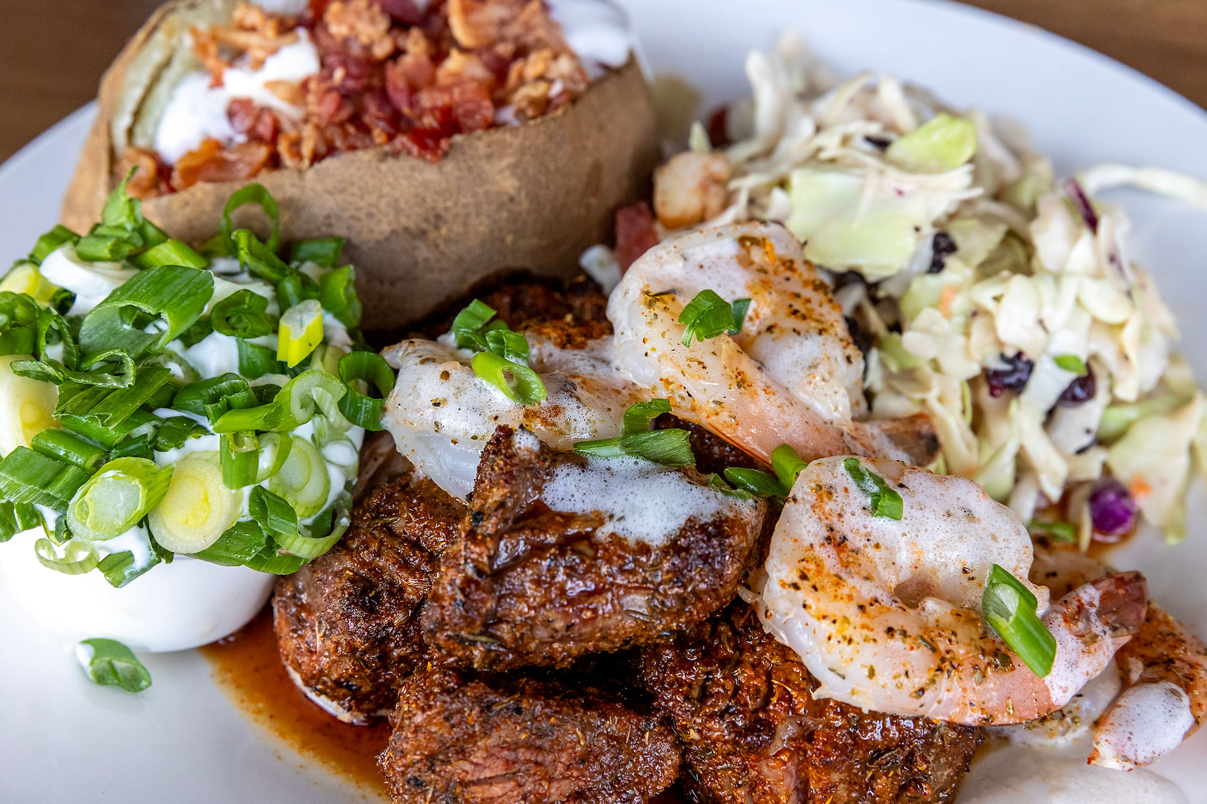 A plate of surf and turf is pictured at Seasons Bites and Burgers Wednesday in Lewiston.