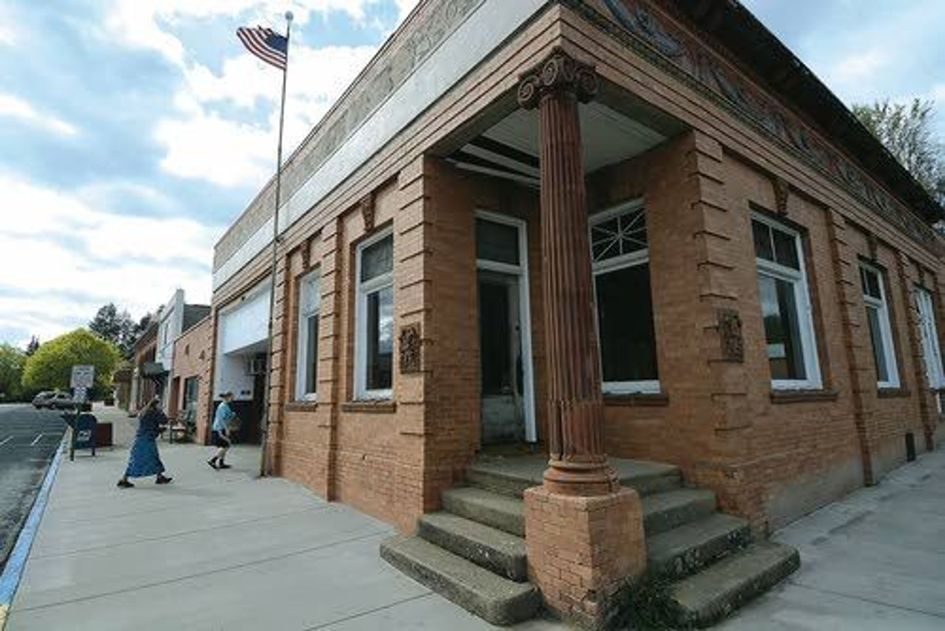 The old Exchange Bank at the corner of Fir and Walnut streets in Genesee has been sold to Vikky Ross and Nikky Hites. The historic structure was placed on the National Register of Historic Places in 1979. Decorative letters (BELOW RIGHT) adorn the exterior of the former Exchange Bank in Genesee.