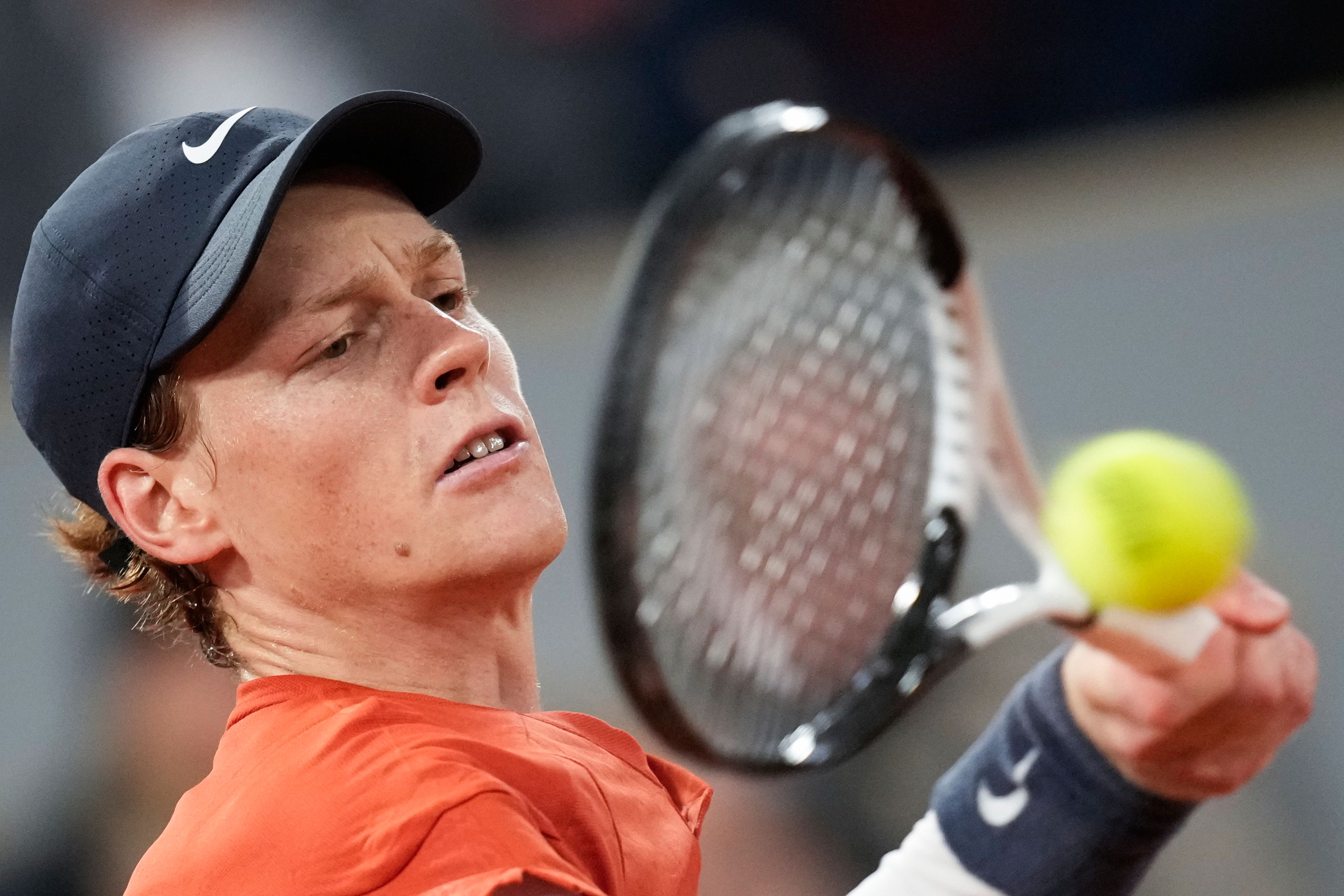 Italy's Jannik Sinner plays a shot against Russia's Pavel Kotov during their third round match of the French Open tennis tournament at the Roland Garros stadium in Paris, Friday, May 31, 2024.