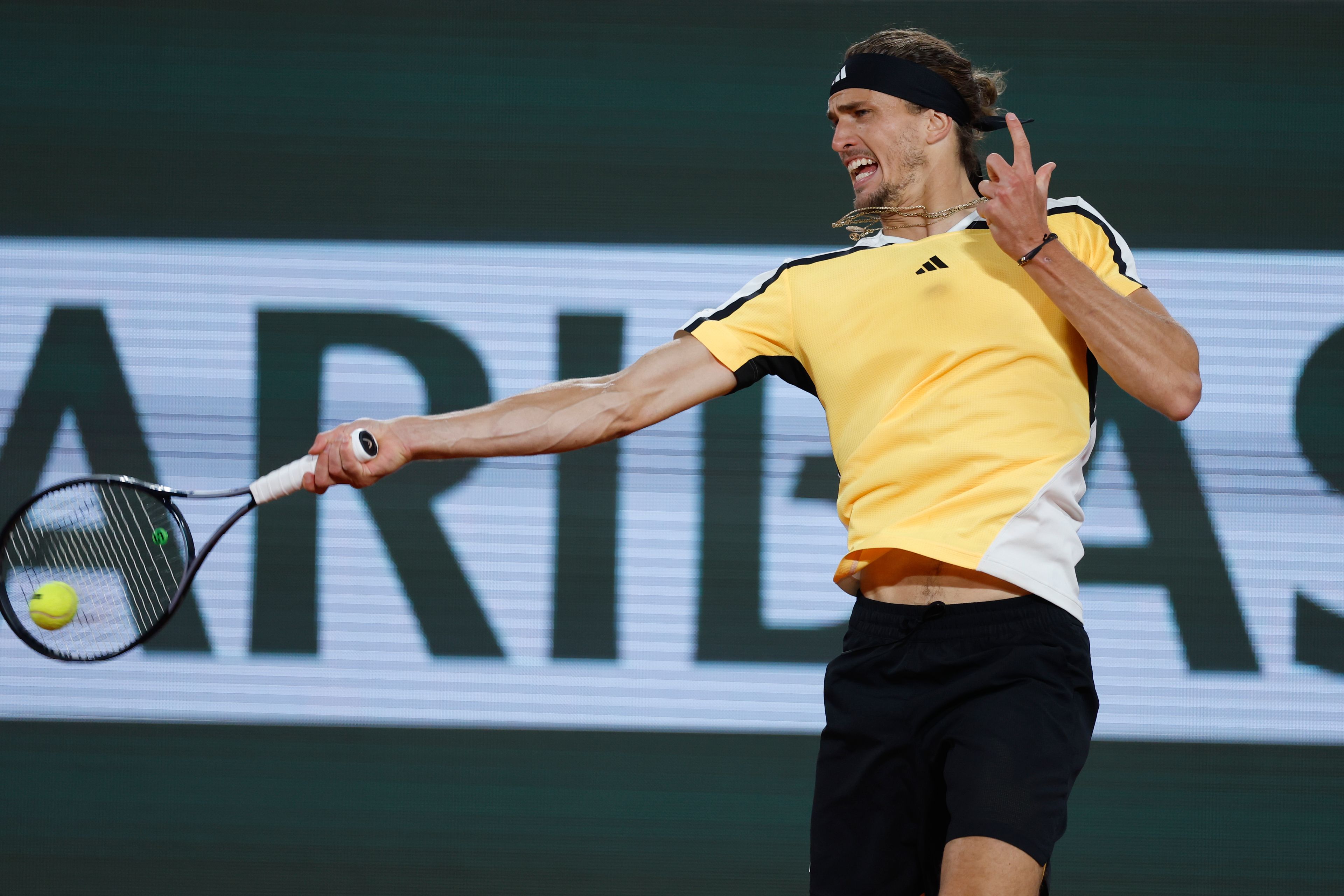 Germany's Alexander Zverev plays a shot against Australia's Alex De Minaur during their quarterfinal match of the French Open tennis tournament at the Roland Garros stadium in Paris, Wednesday, June 5, 2024.