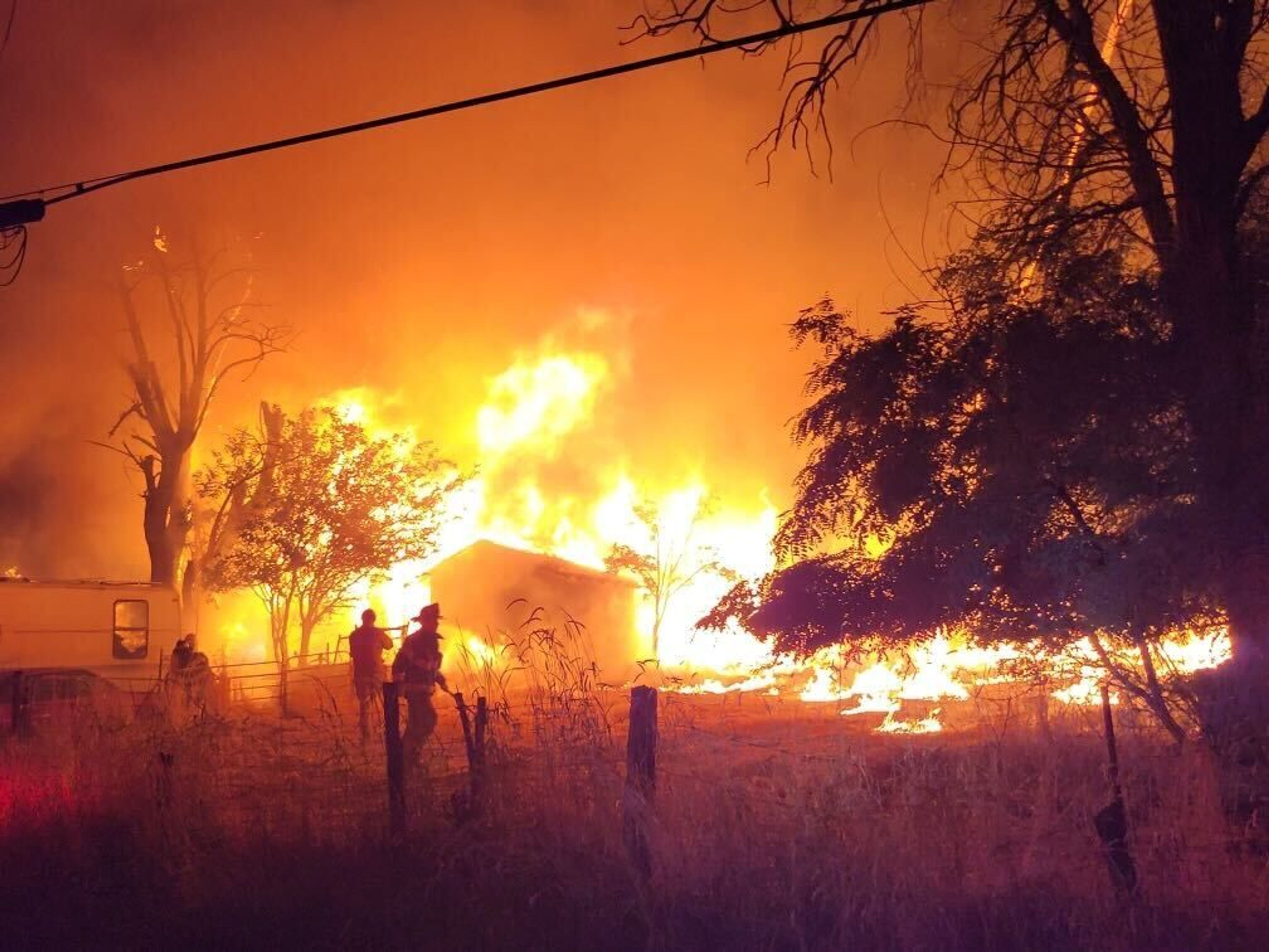 Fire crews battle a blaze Thursday on Poplar Street near 13th Street in Clarkston.