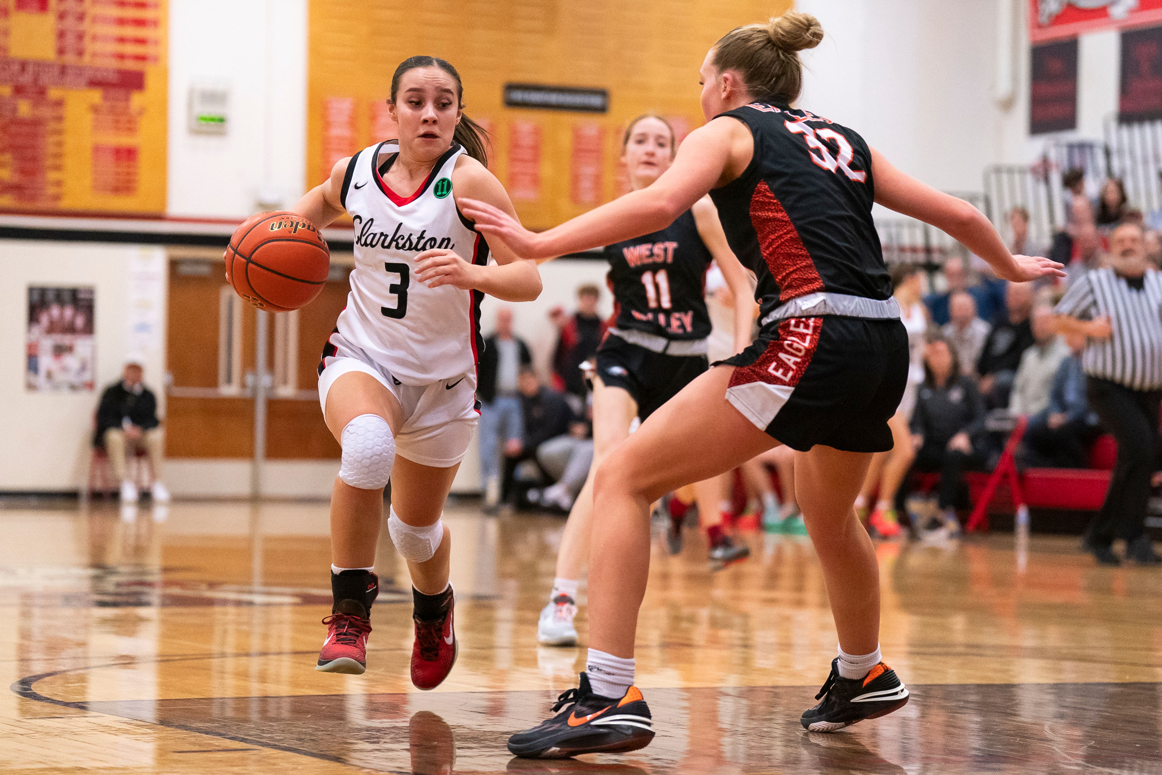 Clarkston’s Kendall Wallace (3) dribbles the ball during their game against West Valley on Tuesday at Clarkston High School.