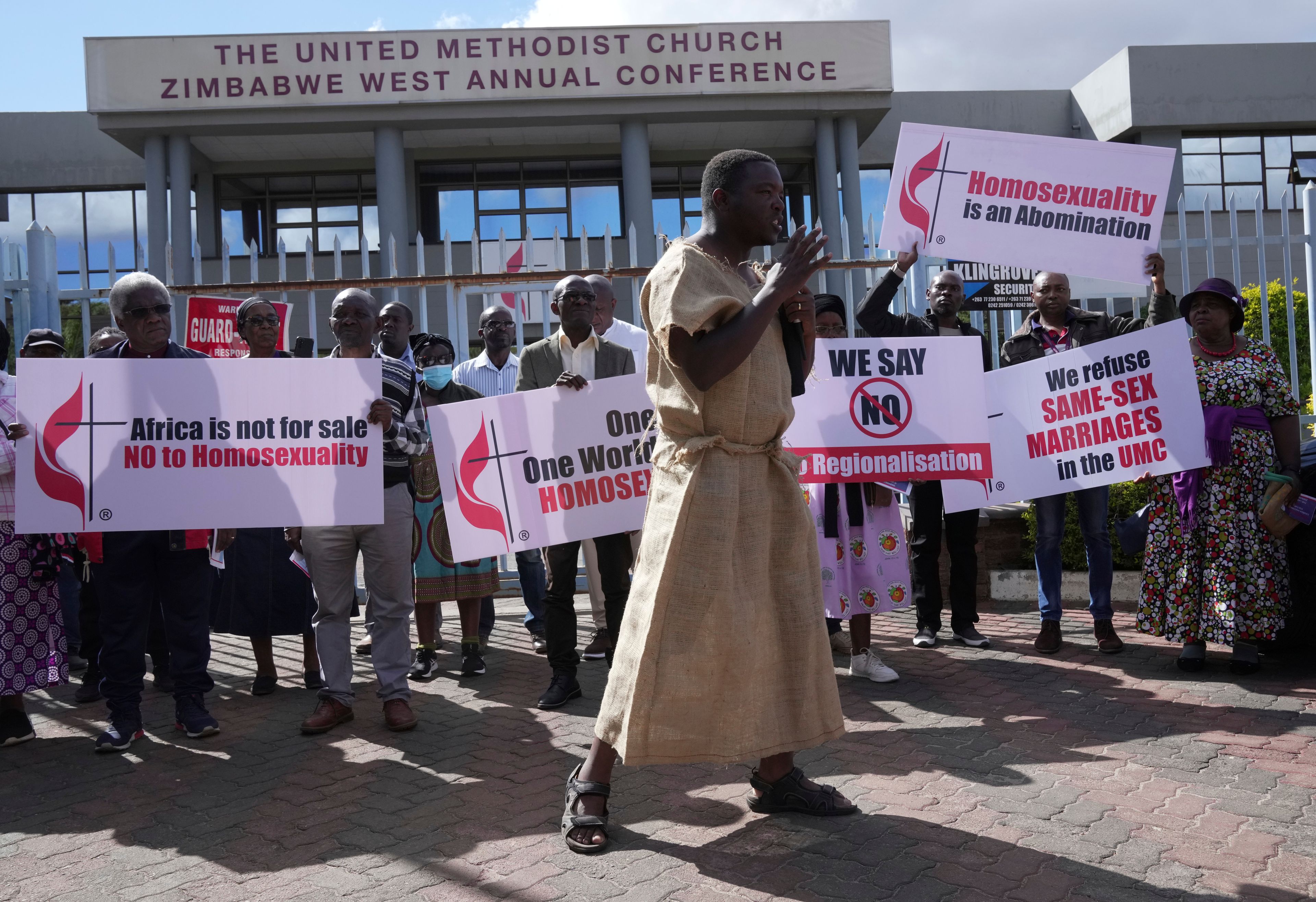 Members of the United Methodist Church in Zimbabwe hold placards while holding a protest at the church premises in Harare, Thursday, May 30, 2024. The protests denouncing homosexuality and the departure of the church from the scriptures and doctrine, come barely a month after the United Methodist Church Worldwide General Conference held in North Carolina, US repealed their church's longstanding ban on LGBTQ clergy, removing a rule forbidding "self-avowed practising homosexuals" from being ordained or appointed as ministers.