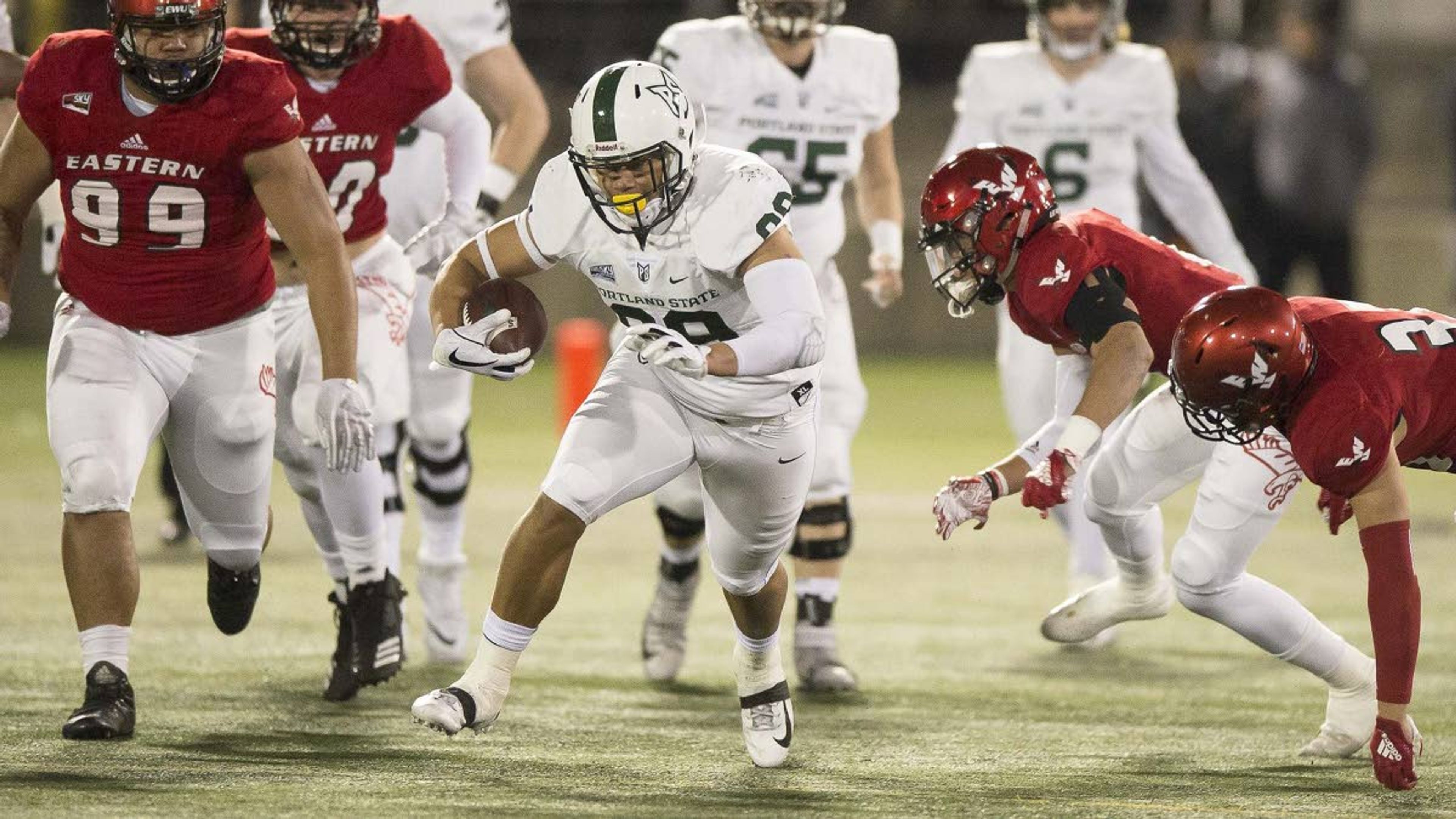 Portland State tight end Charlie Taumoepeau (center) has been steadily rising on NFL draft boards.