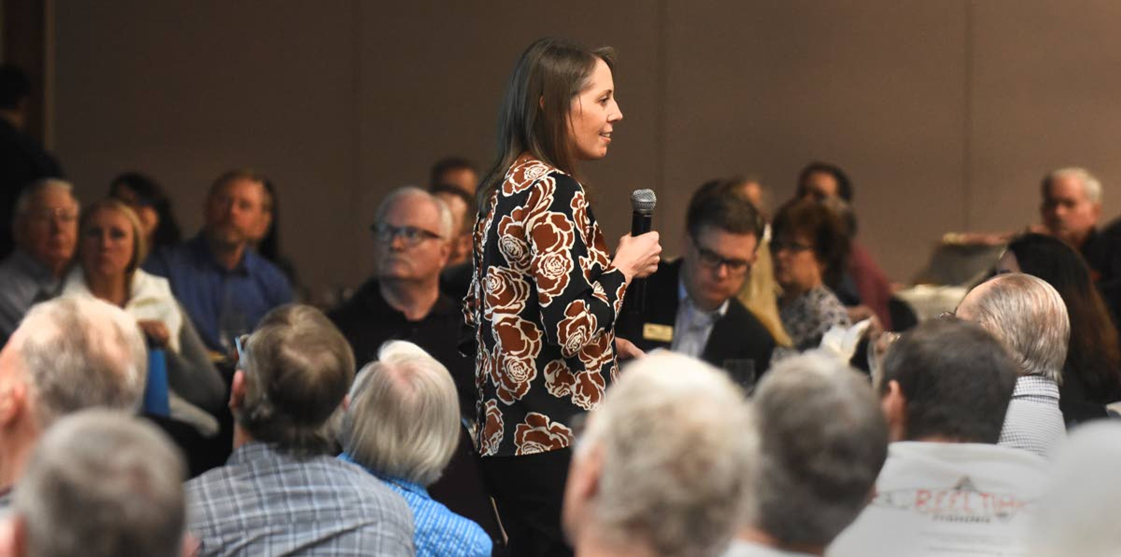 Kristin Meira of the Pacific Northwest Waterways Association talks Thursday at the Red Lion Hotel in Lewiston about the value of the four lower Snake River dams in terms of fish, power and water.