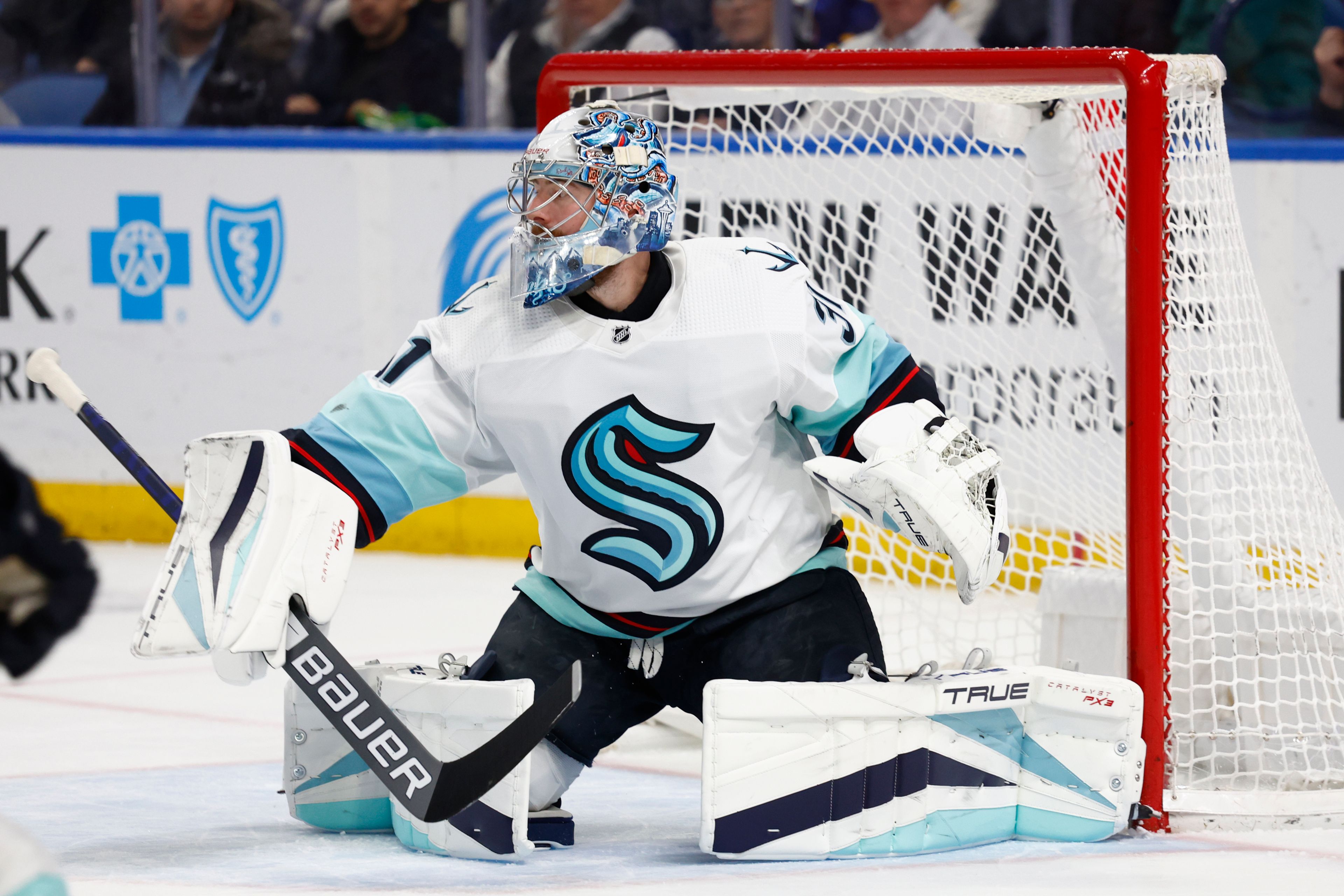 Seattle Kraken goaltender Philipp Grubauer (31) makes a pad save during the first period of an NHL hockey game against the Buffalo Sabres, Tuesday, Jan. 10, 2023, in Buffalo, N.Y. (AP Photo/Jeffrey T. Barnes)