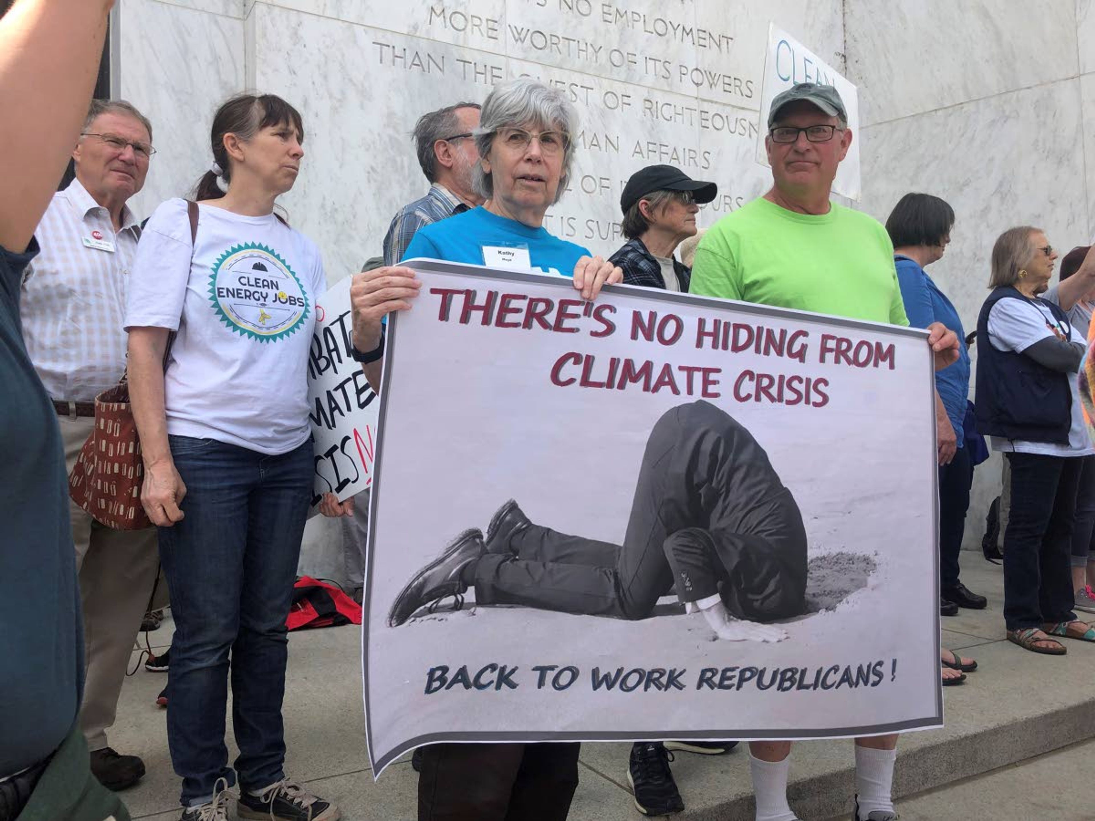 Protesters flood the steps of the Oregon State Capitol Tuesday, June 25, 2019, to push back against a Republican walkout over a climate change bill that has entered its sixth day in Salem, Ore. The president of the Oregon Senate said Tuesday there weren't enough votes in his majority Democratic caucus to approve a landmark climate bill that has sparked a walkout by Republicans and left other key issues such as the state budget in limbo. (AP Photo/Sarah Zimmerman)