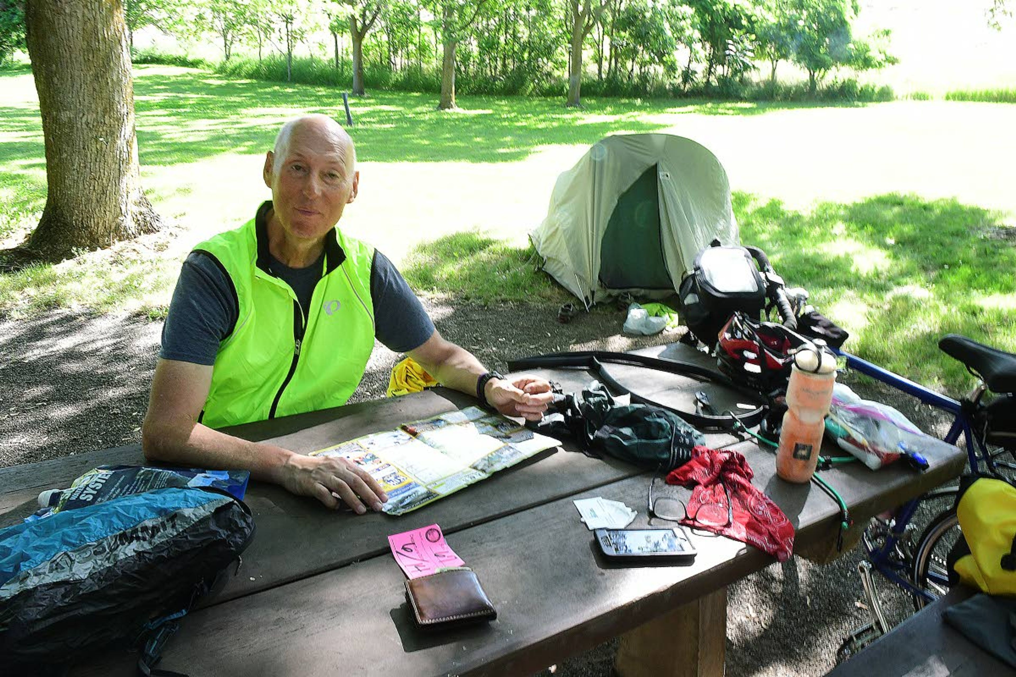 Jon Olson of Milwaukee, in the midst of a cross-country bicycle trip, camped at Hells Gate State Park in Lewiston on Friday.