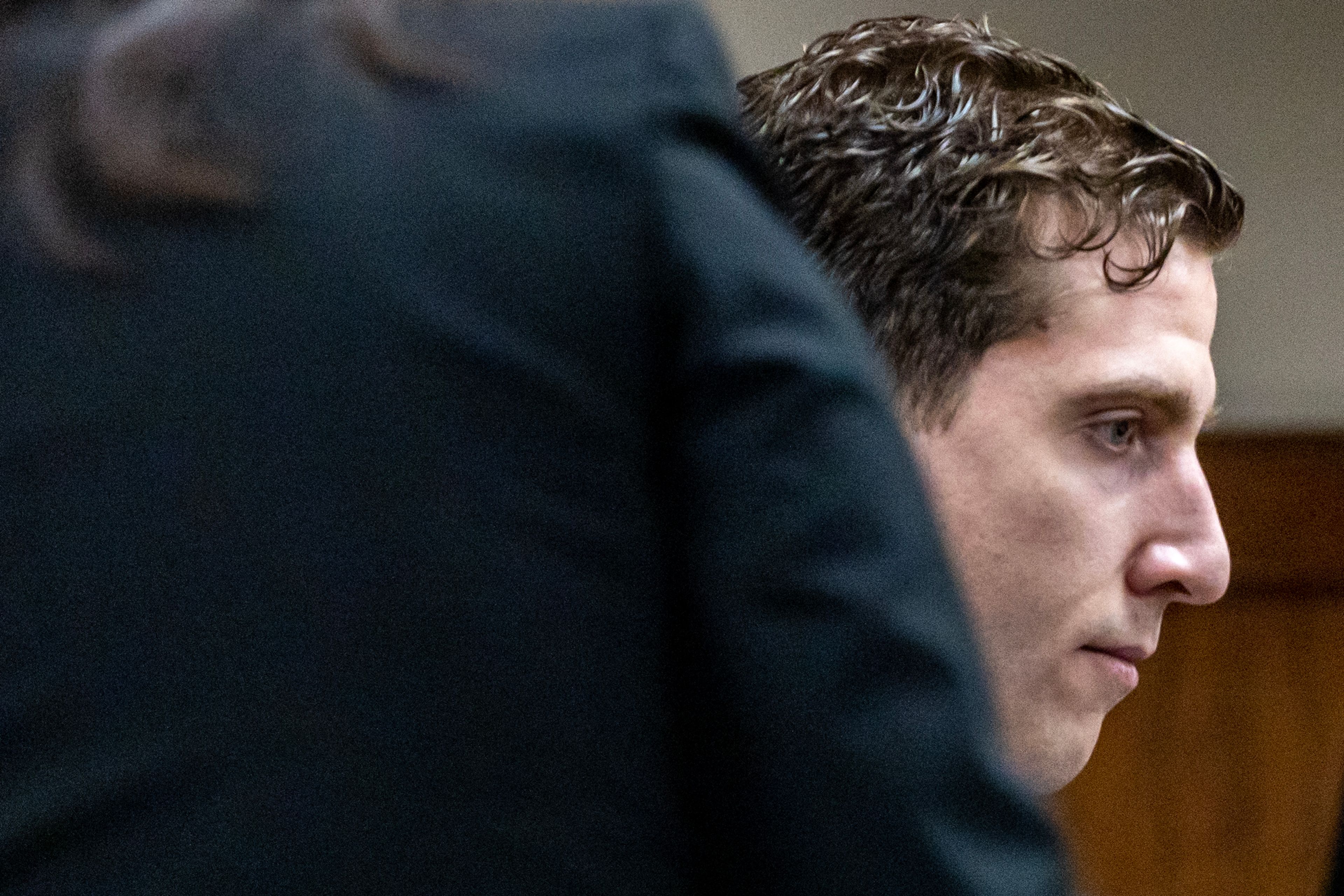 Bryan Kohberger sits down at table for a hearing Tuesday at the Latah County Courthouse in Moscow.