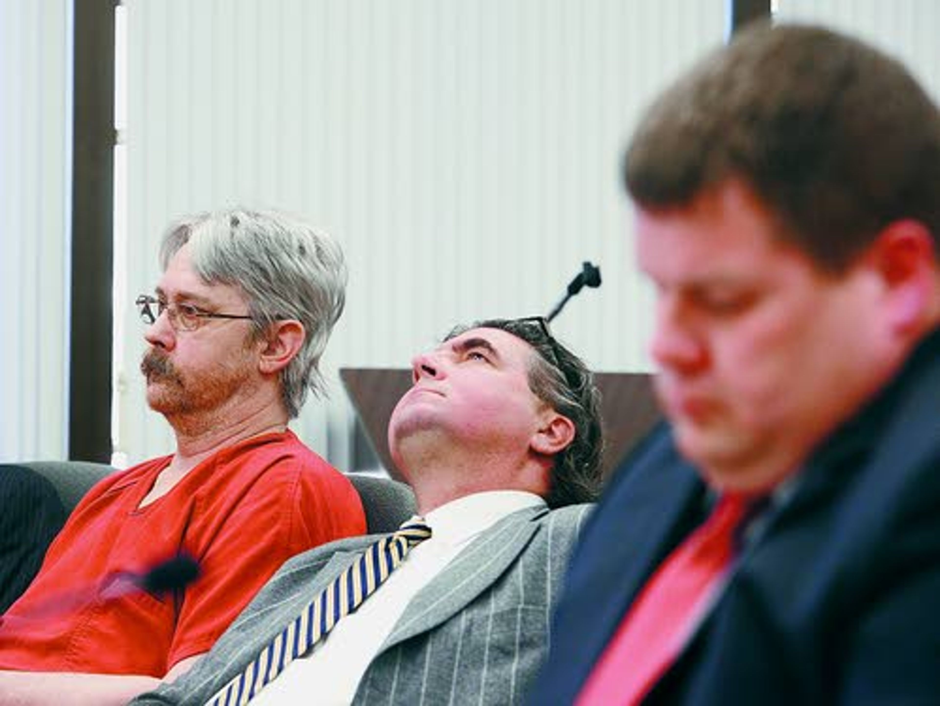 Rick Riffe’s defense attorney, John Crowley (center), reacts as Lewis County Prosecutor Jonathan Meyer (right) makes a statement during a sentencing hearing Tuesday in Chehalis, Wash.