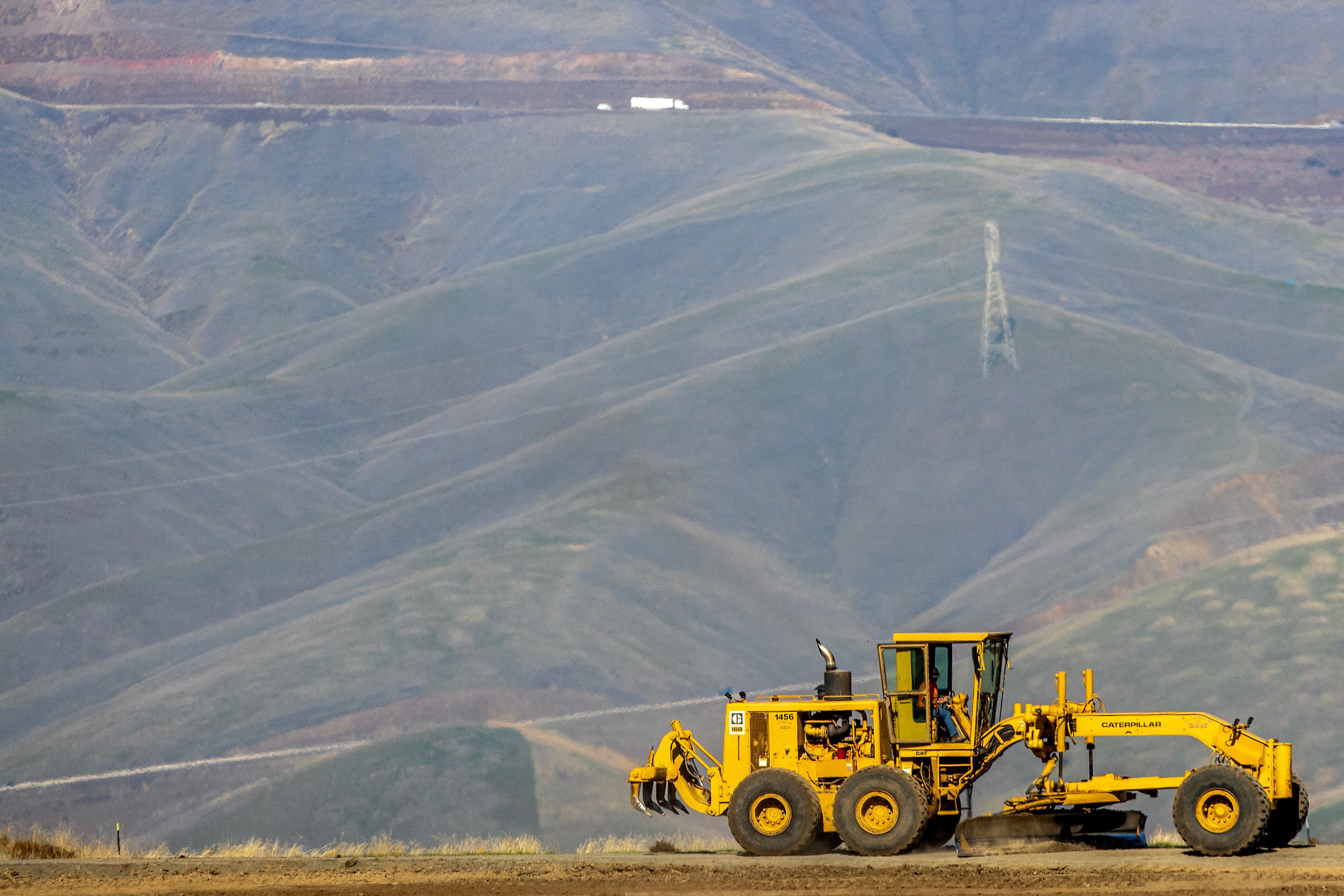 A vehicles works at the future athletic fields Wednesday at Lewiston High School.