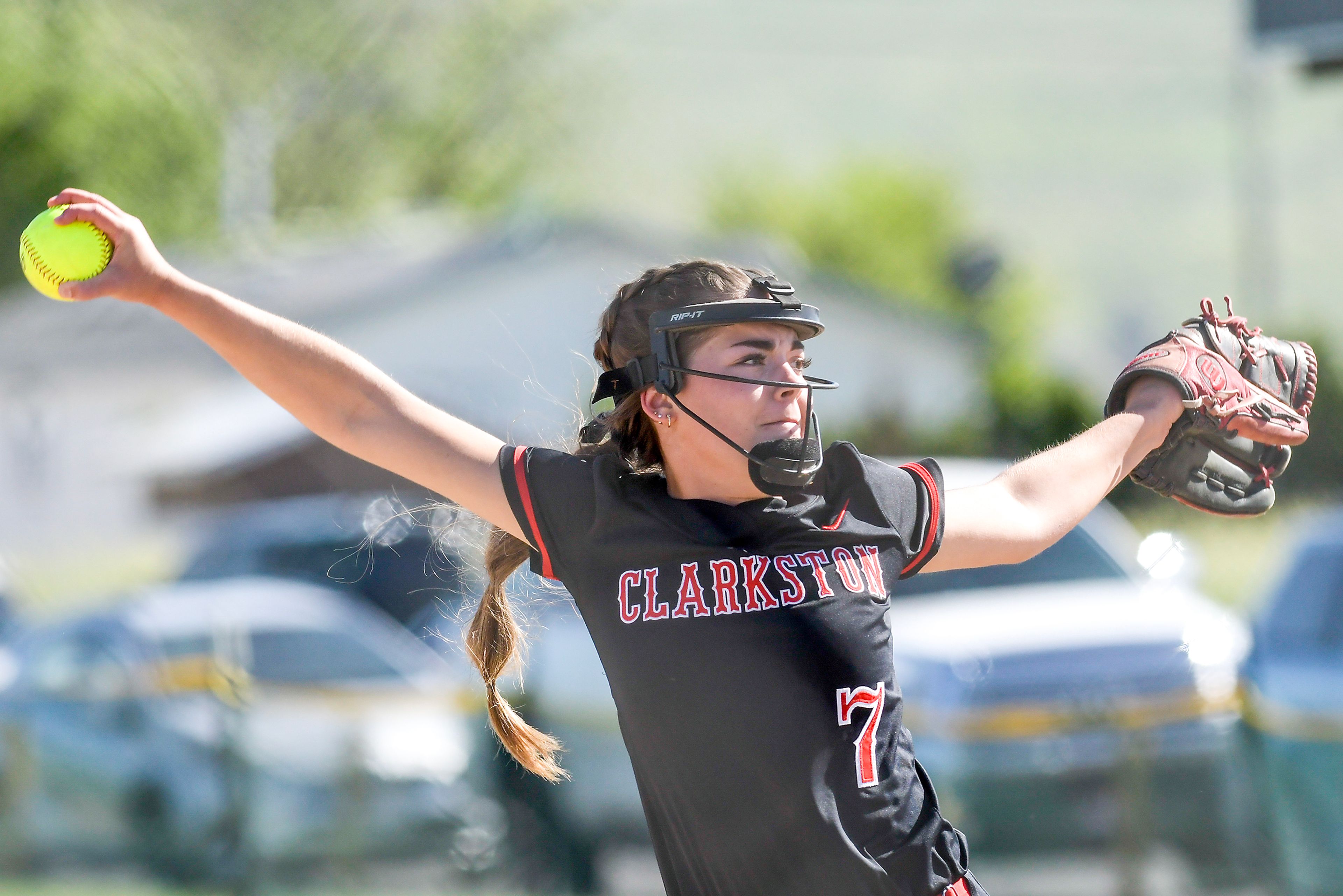 Clarkston pitcher Emma McManigle winds up for a pitch against Pullman in an inning of a district tournament semifinal round game Thursday in Clarkston.