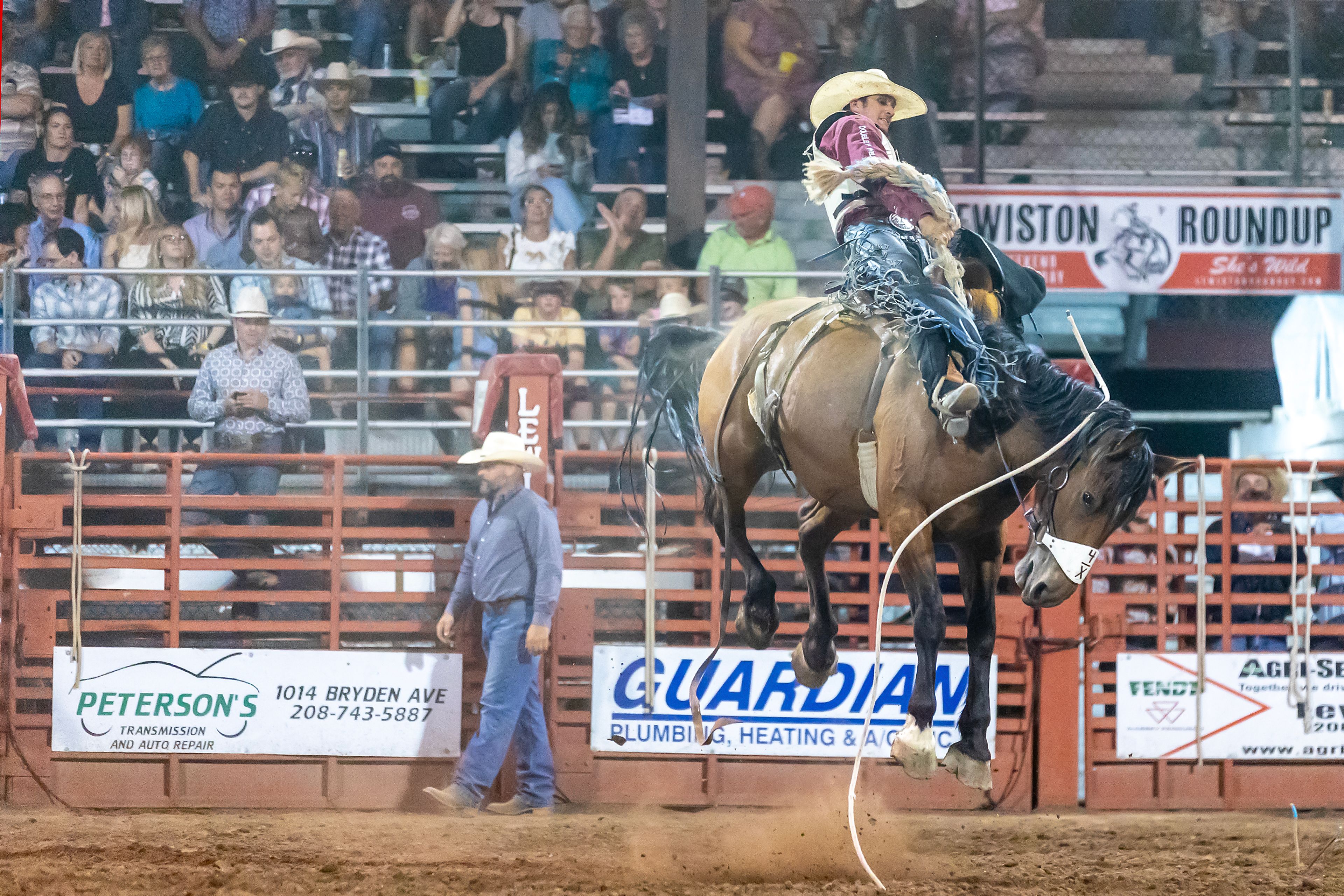 Darien Johnson rides Lewandowski’s S in the saddle bronc competition on day 2 of the Lewiston Roundup.