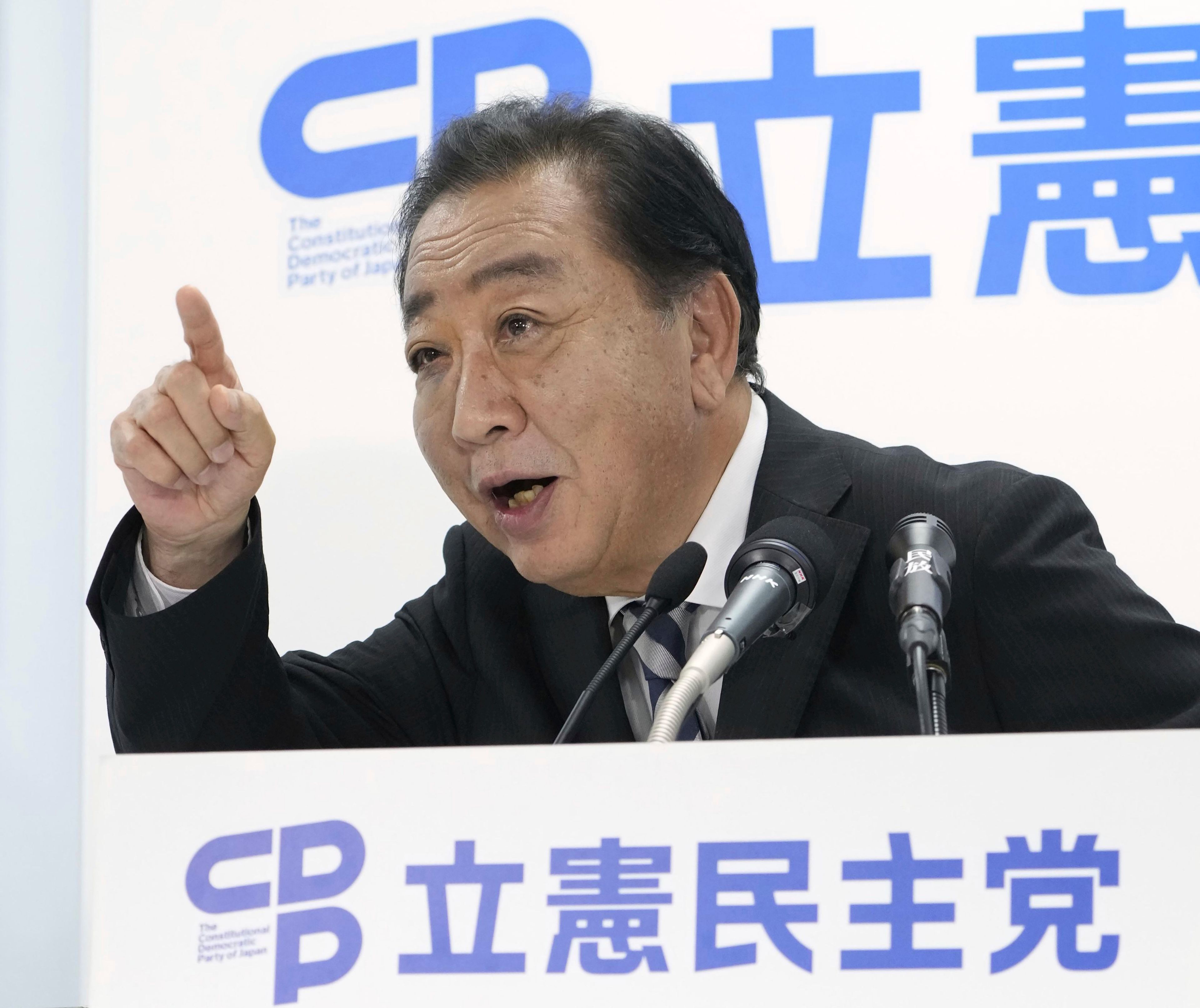 Yoshihiko Noda, leader of Japan's opposition Constitutional Democratic Party, speaks to the media about the lower house election at the party's headquarters Sunday, Oct. 27, 2024 in Tokyo, (Kyodo News via AP)