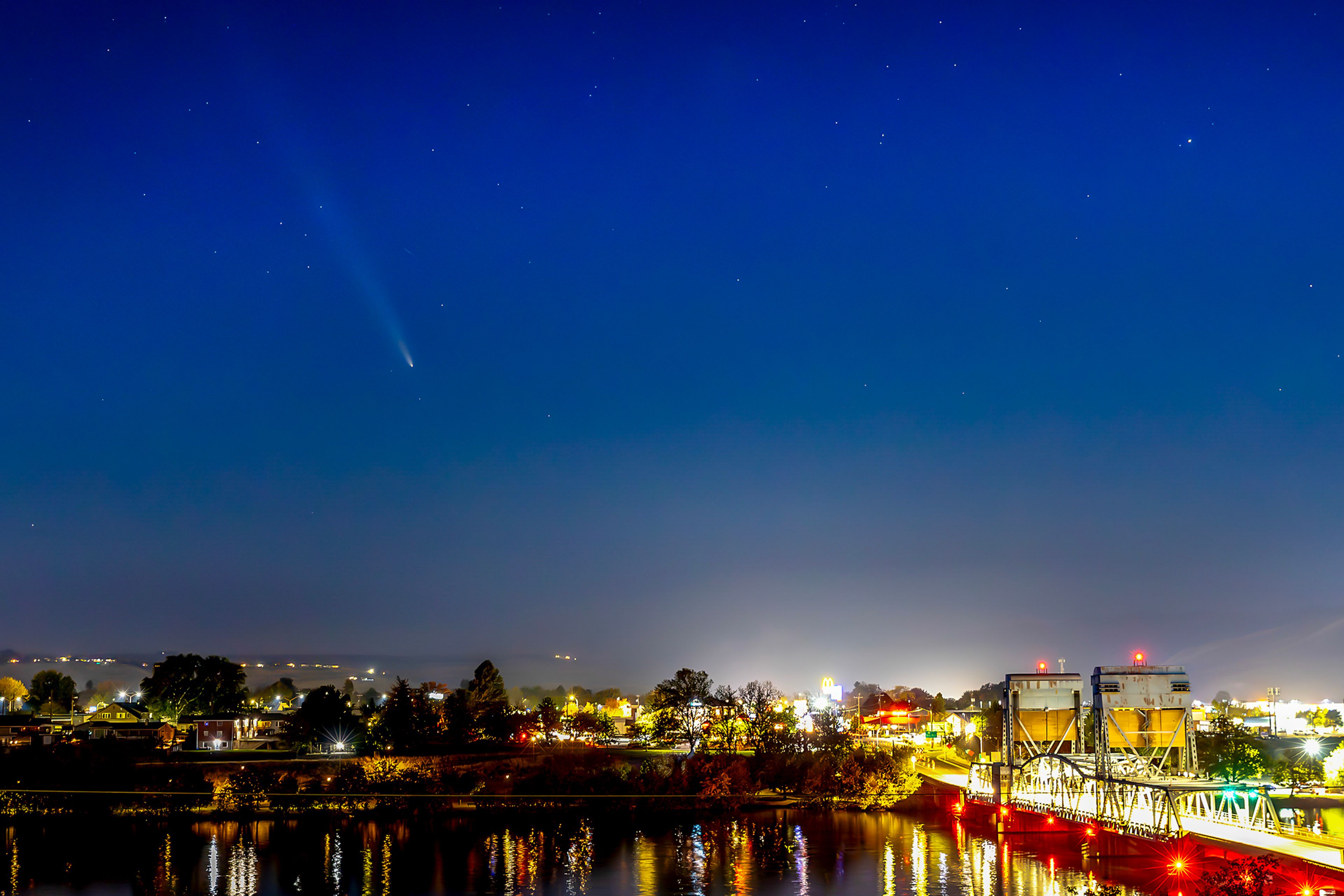 Comet Tsuchinshan�ATLAS is seen in the night sky Monday over Clarkston. The comet can be seen looking to the west for about 45 minutes to an hour after sunset. The comet will travel higher into the sky, growing dimmer each night until around Halloween. The orbital period of the comet was calculated to be more than 80,000 years, meaning the last time it may have been visible was when Neanderthals walked the earth. The most current calculations from NASA�s Solar System Dynamics group show that it is on a hyperbolic path, meaning it will not return. In a busy year for astral phenomenon, from auroras to comets, the largest supermoon, called the Hunter�s Moon, will rise Thursday.