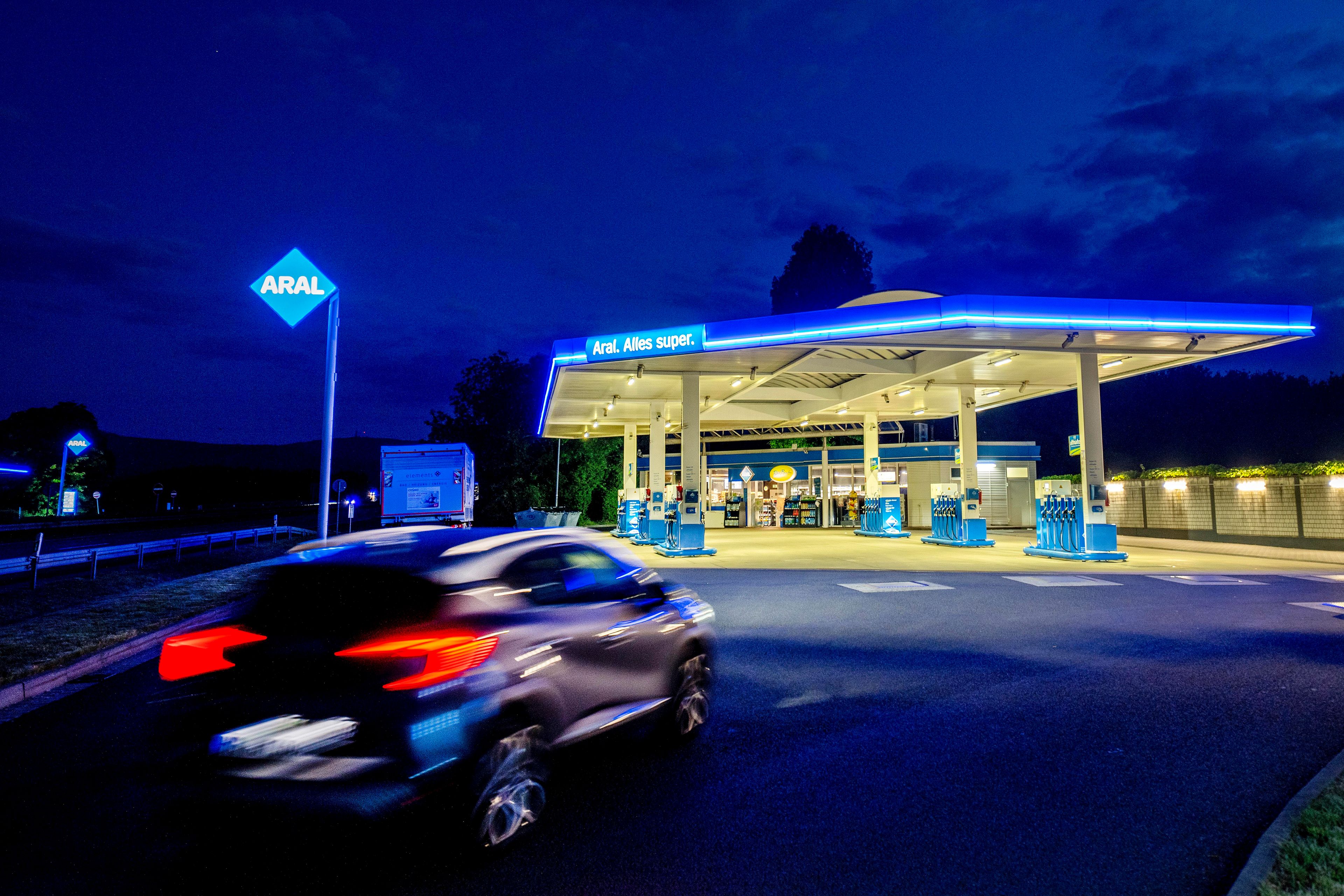 A car approaches a gas station in Frankfurt, Germany, earlier this month. People across the world are confronted with higher fuel prices as the war in Ukraine and lagging output from producing nations drive prices higher. Drivers are looking at the numbers on the gas pump and rethinking their habits and finances, pushing some to walk, bike or use public transport.