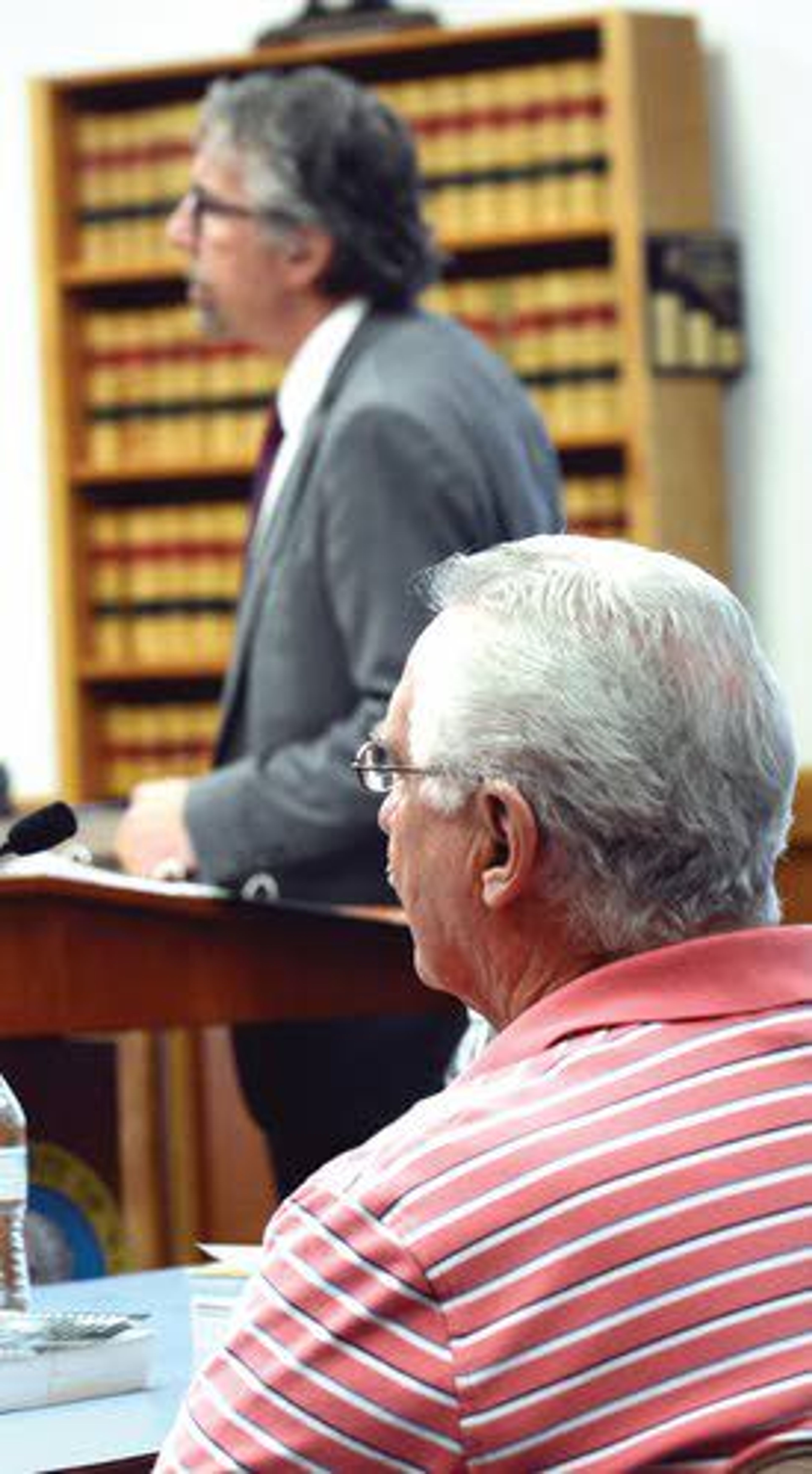 Defendant Bernie McCabe looks on as his attorney, Steve Martonick, questions a witness Thursday.