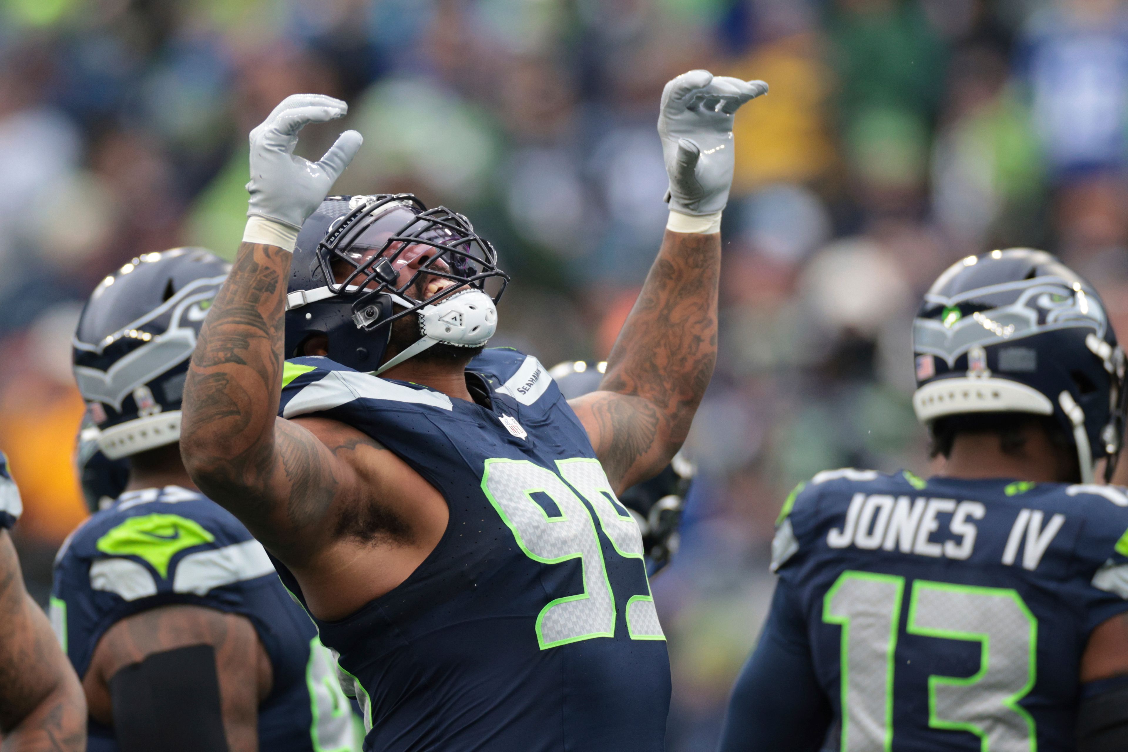 Seattle Seahawks defensive end Leonard Williams (99) celebrates a sack during an NFL football game against the Arizona Cardinals, Sunday, Nov. 24, 2024, in Seattle. (AP Photo/Jason Redmond)