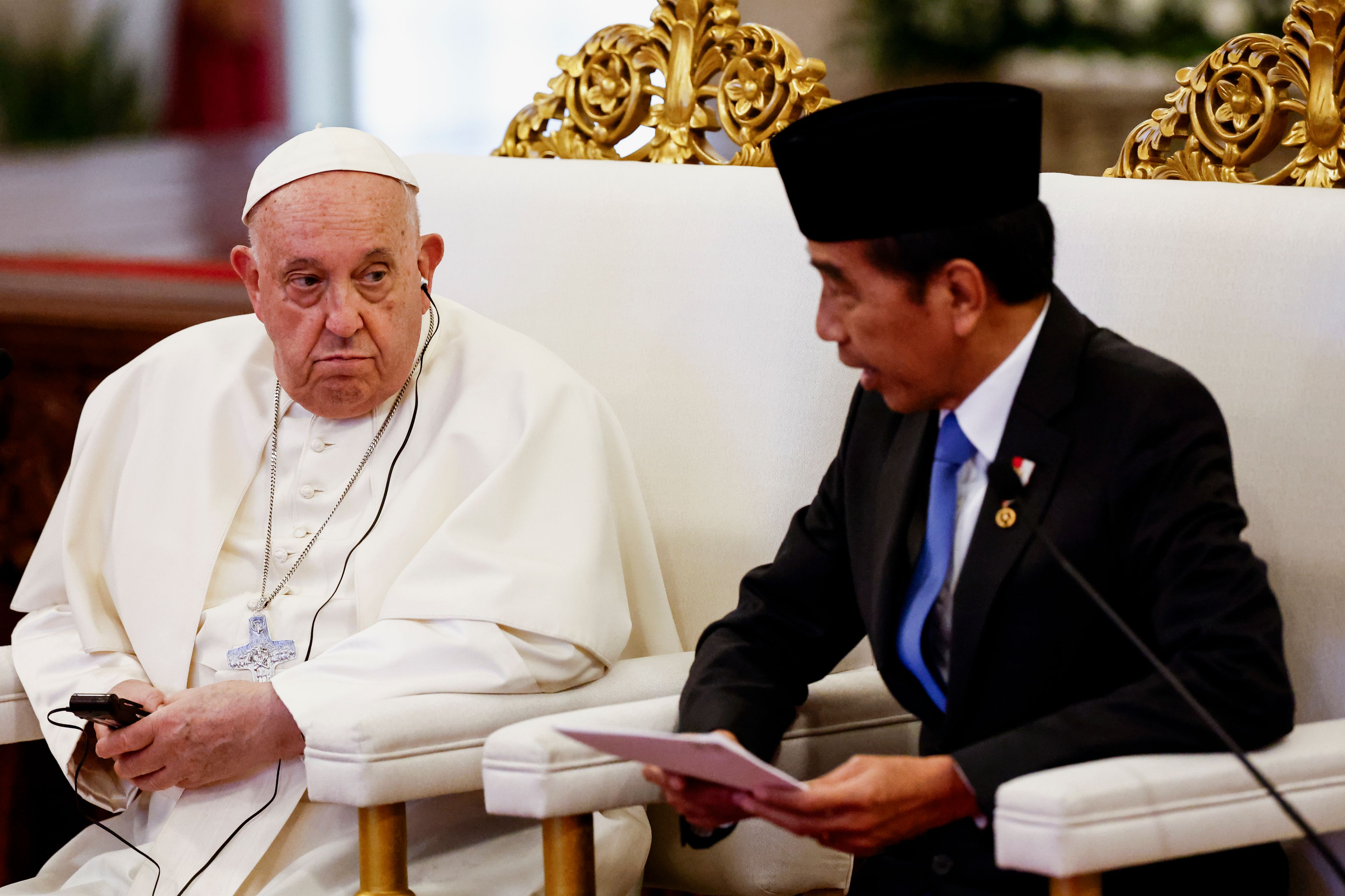 Pope Francis, left, and Indonesian President Joko Widodo attend a meeting with Indonesian authorities, civil society and the diplomatic corps, during his apostolic visit to Asia, at the Presidential Palace in Jakarta Wednesday, Sept. 4, 2024.