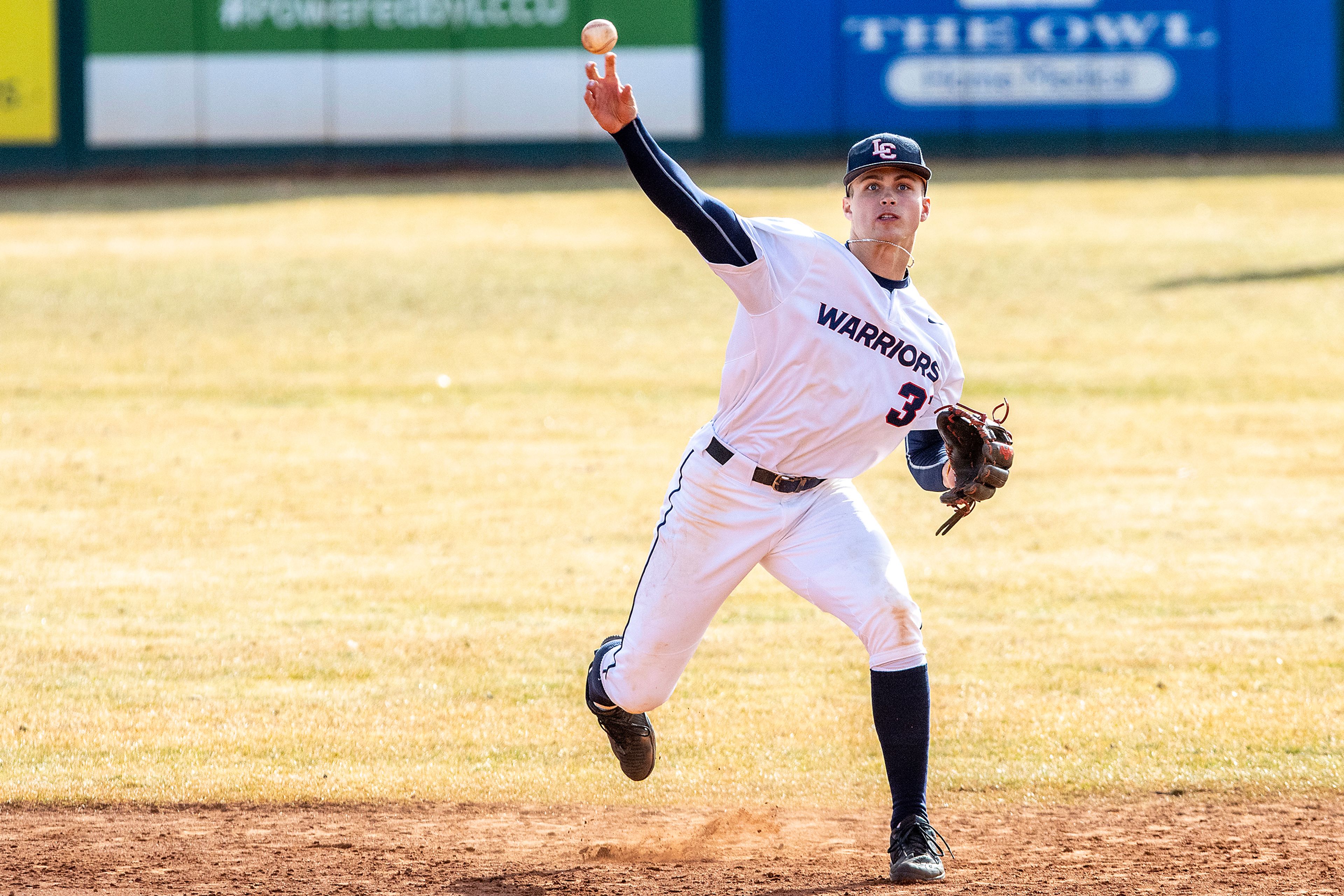 Lewis-Clark State second baseman Cruz Hepburn throws to first against UBC in a doubleheader Feb. 18, 2023, at Lewis-Clark State College in Lewiston.