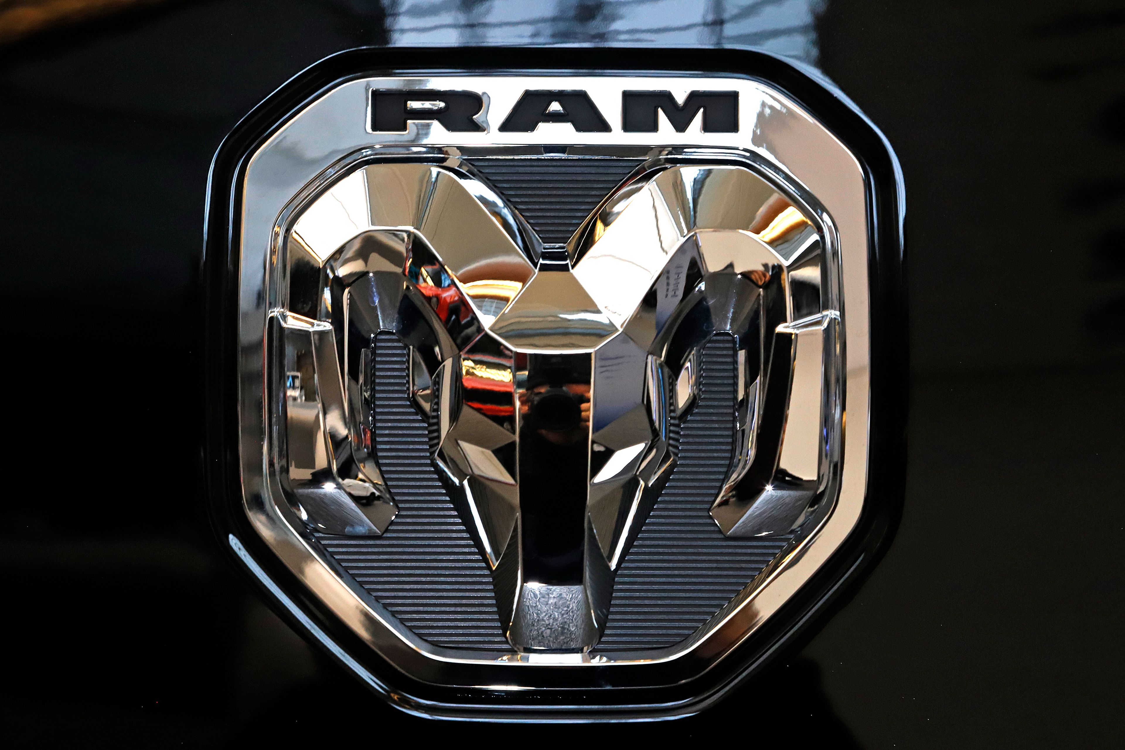 FILE - This Feb. 13, 2020 photo shows the Ram truck logo at the 2020 Pittsburgh International Auto Show in Pittsburgh.