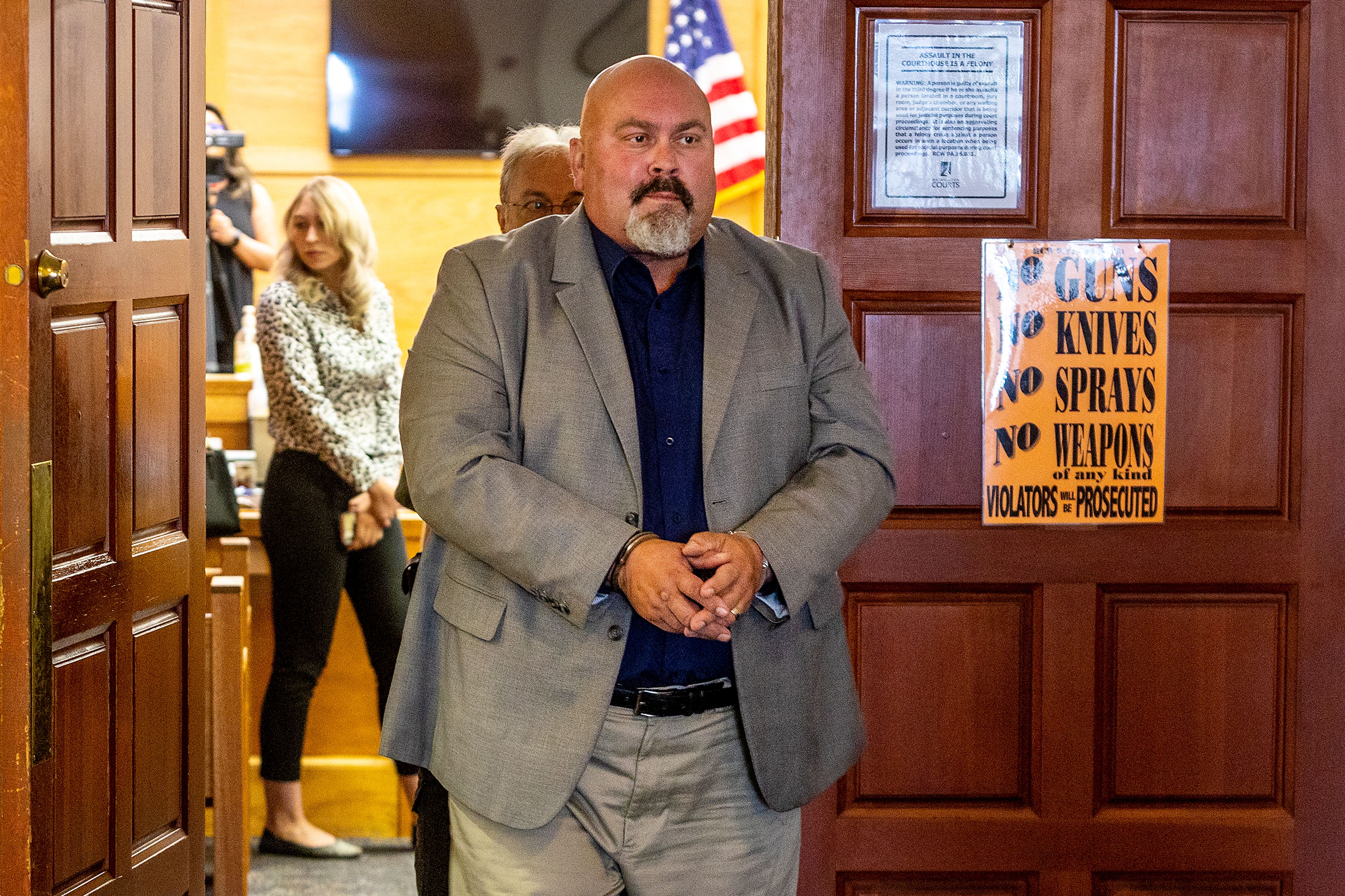 August Frank/TribuneScott Gallina is led out of the courtroom in handcuffs Monday following his sentencing at the Asotin County Courthouse.