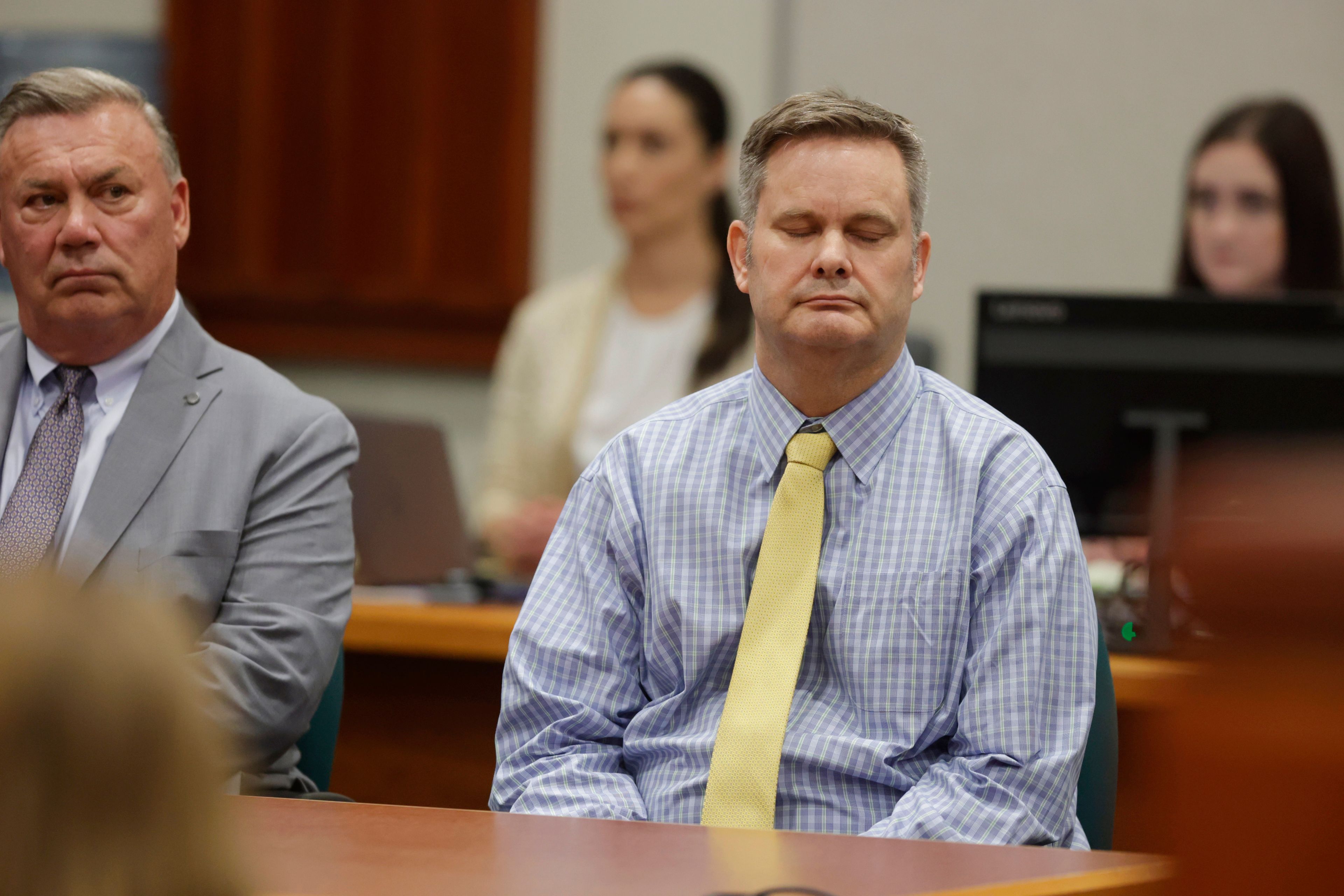 Chad Daybell sits and closes his eyes after the jury's verdict in his murder trial was read at the Ada County Courthouse in Boise, Idaho, on Thursday, May 30, 2024. Daybell was convicted of killing his wife and his new girlfriend's two youngest kids in a strange triple murder case that included claims of apocalyptic prophesies, zombie children and illicit affairs. (AP Photo/Kyle Green, Pool)