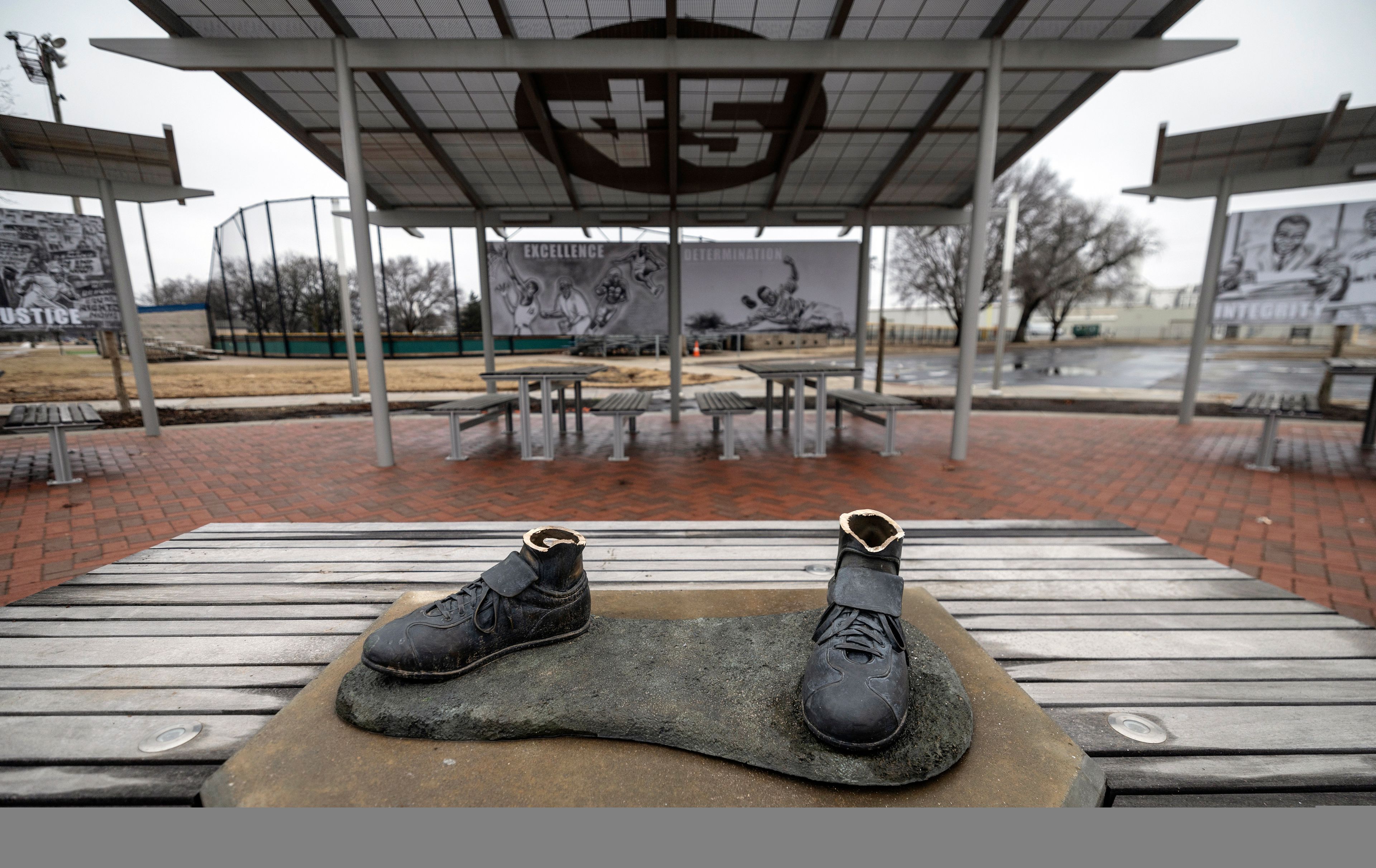 FILE - A view of the bronze Jackie Robinson cleats that were left behind when the statue of the legendary baseball pioneer was stolen from a park in the early morning hours, in Wichita, Kan., Jan. 25, 2024. (Travis Heying/The Wichita Eagle via AP File)