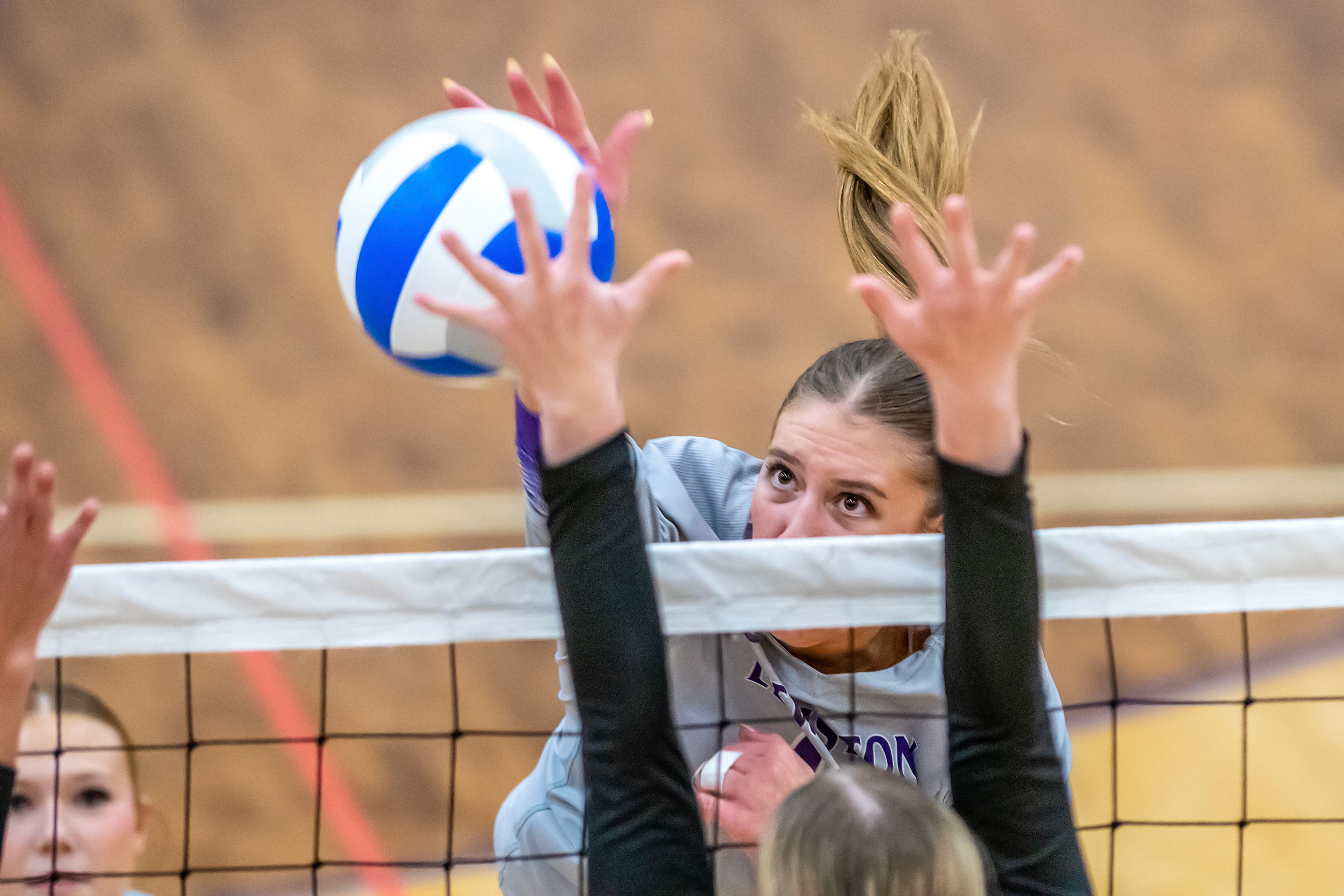 Lewiston outside hitter Addy McKarcher spikes the ball against Moscow in a 5A district tournament match Tuesday in Lewiston.