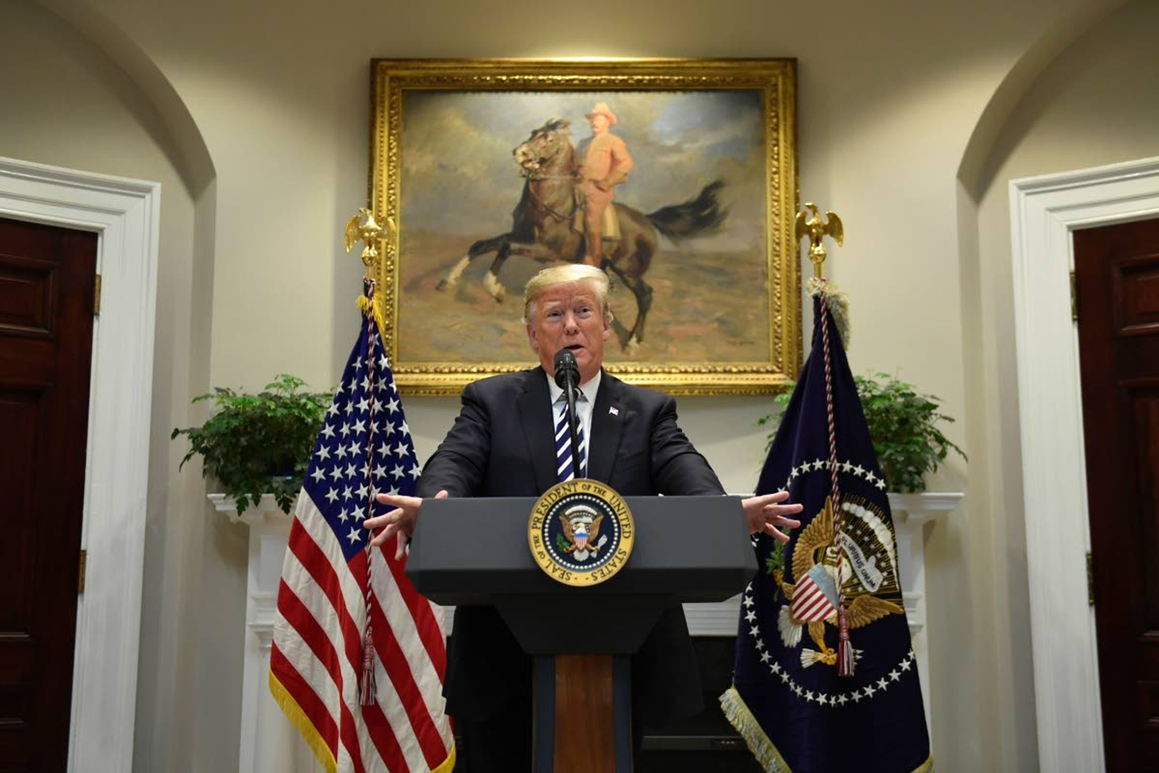 President Donald Trump talks about immigration and border security from the Roosevelt Room of the White House Thursday in Washington.