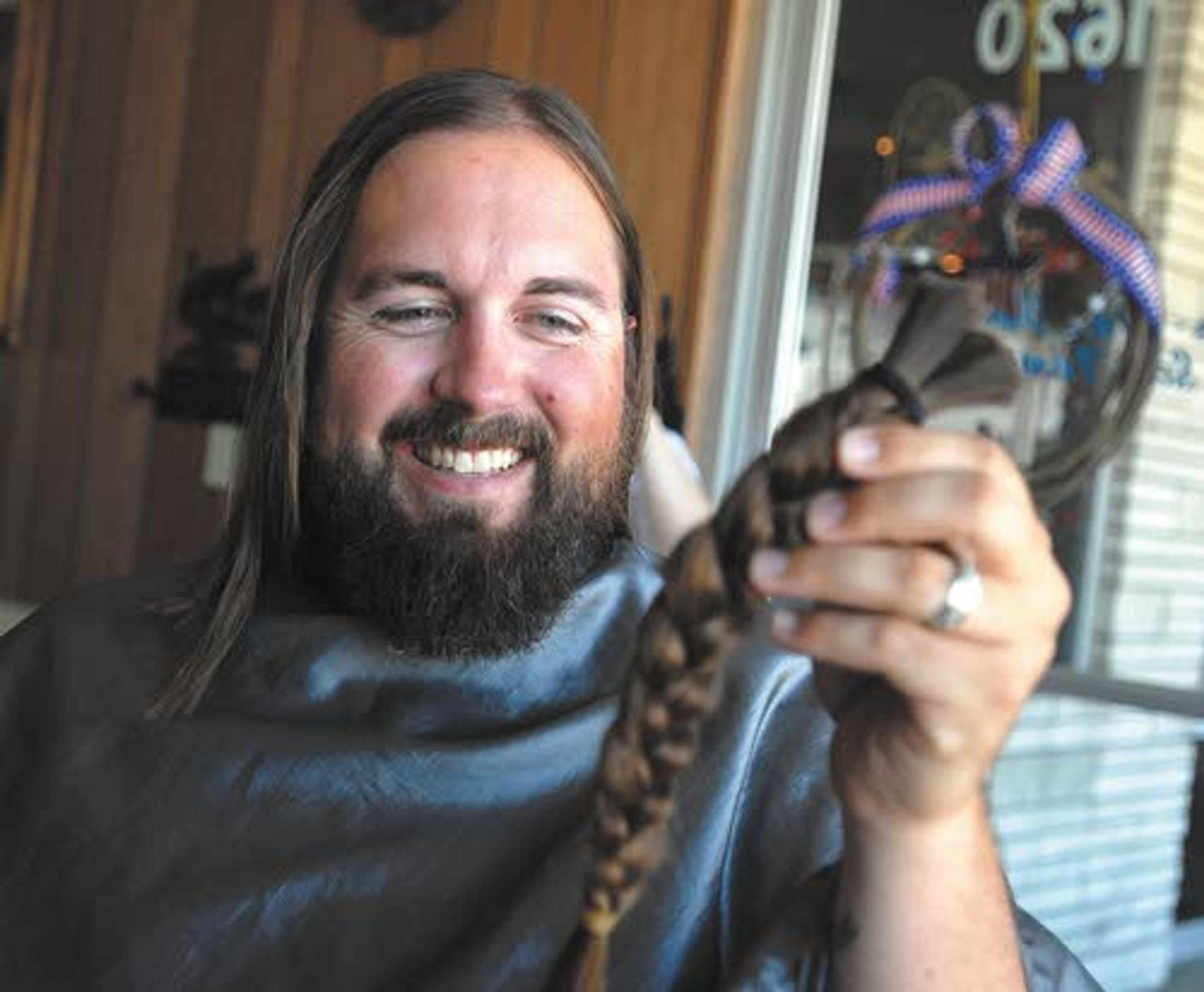 A smile with a hint of sadness as I get my first look at my
detached braid.