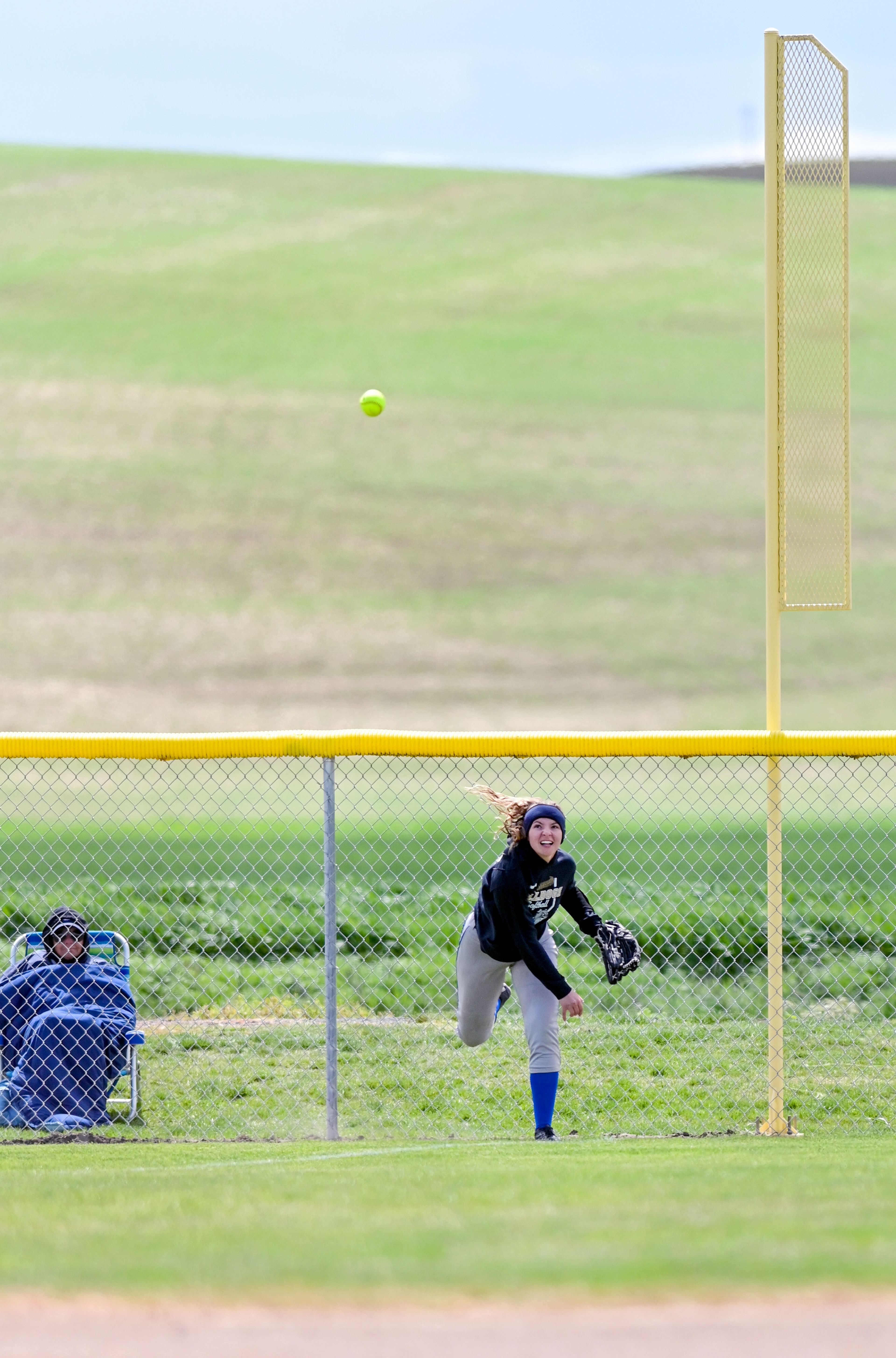 Genesee’s Mia Scharnhorst throws the ball from the outfield during an Idaho Class 1A state championship game Friday in Genesee.