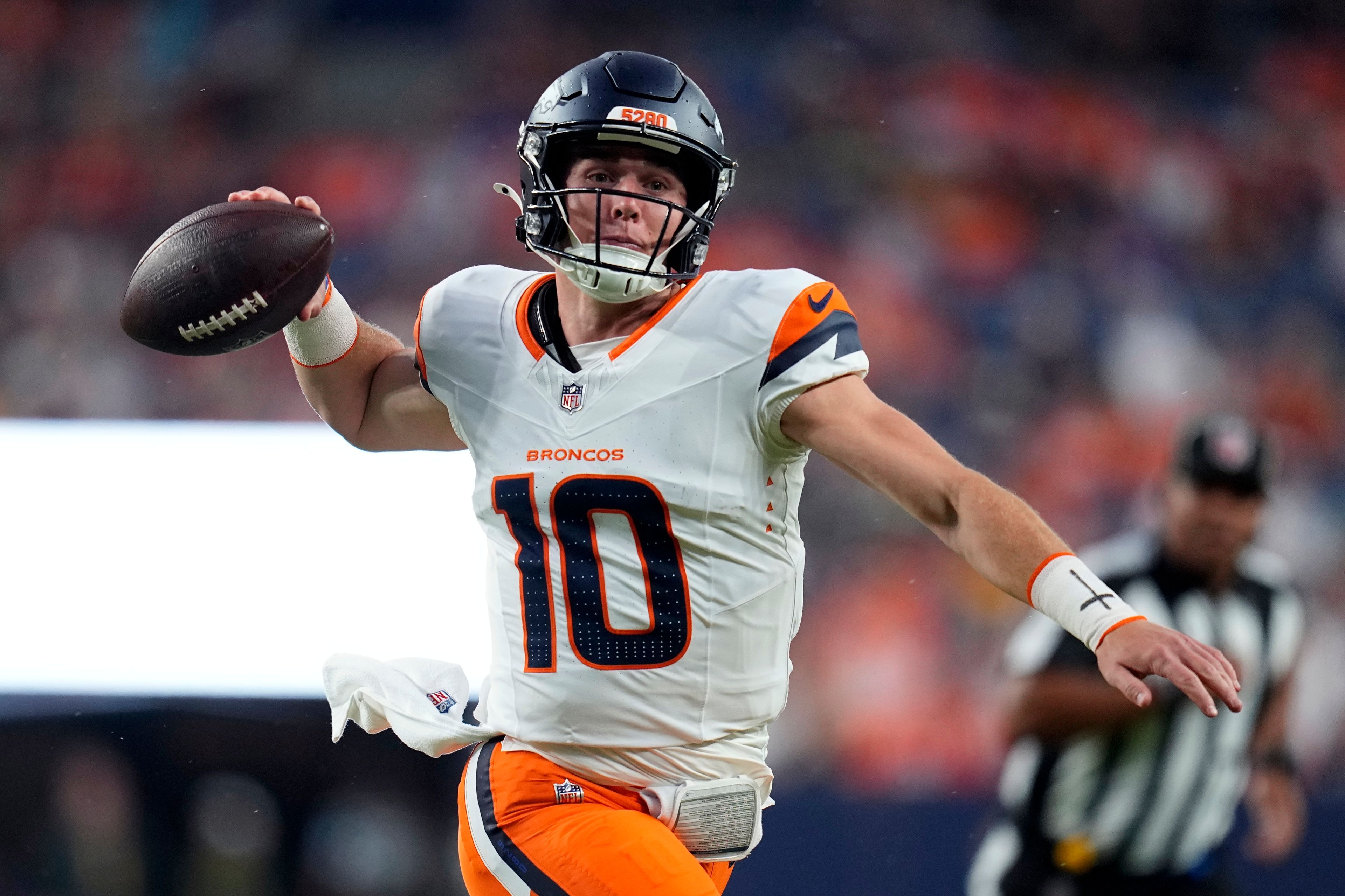 Denver Broncos quarterback Bo Nix passes during the first half of a preseason NFL football game against the Green Bay Packers, Sunday, Aug. 18, 2024, in Denver. (AP Photo/Jack Dempsey)