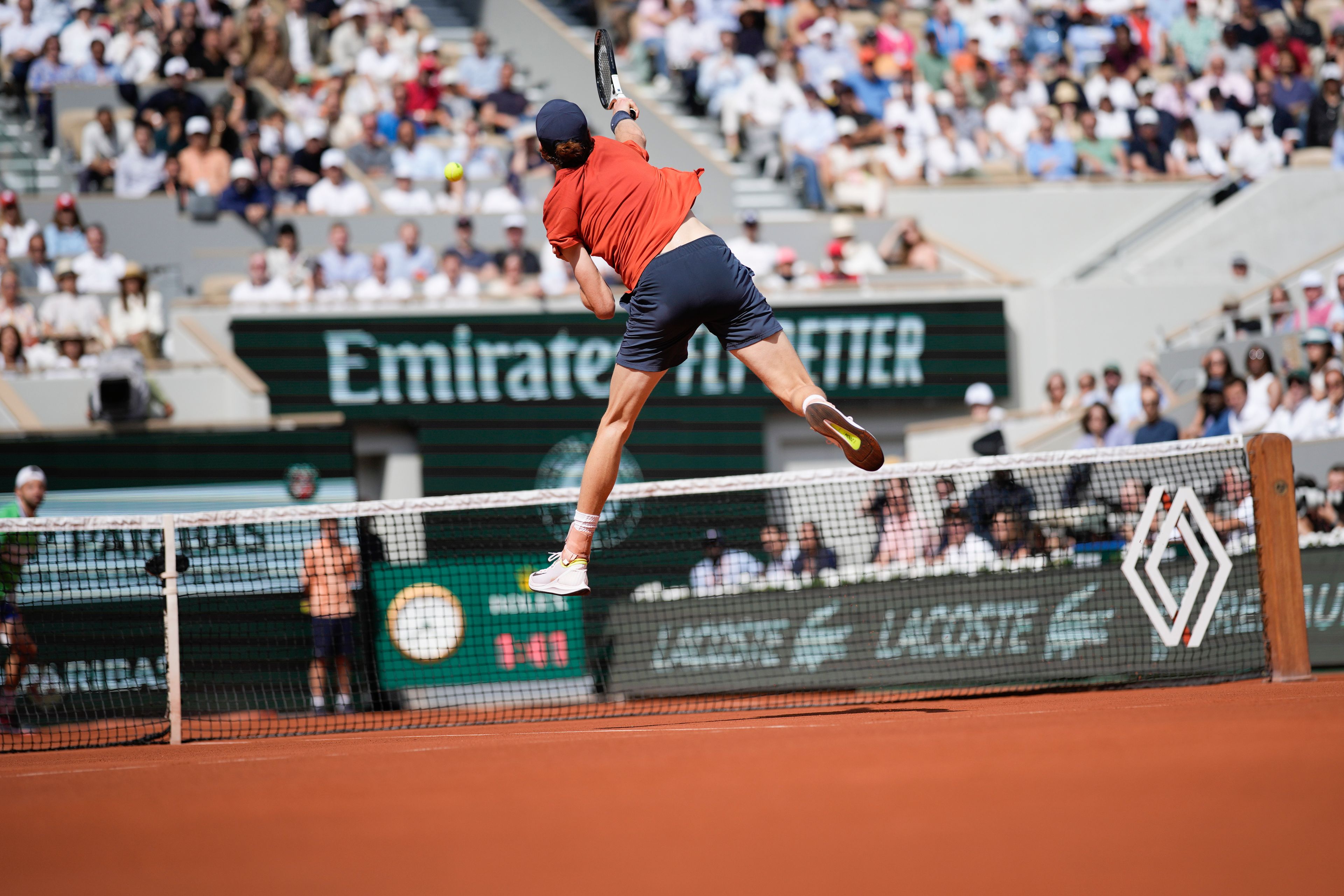 Italy's Jannik Sinner plays a shot against Bulgaria's Grigor Dimitrov during their quarterfinal match of the French Open tennis tournament at the Roland Garros stadium in Paris, Tuesday, June 4, 2024.