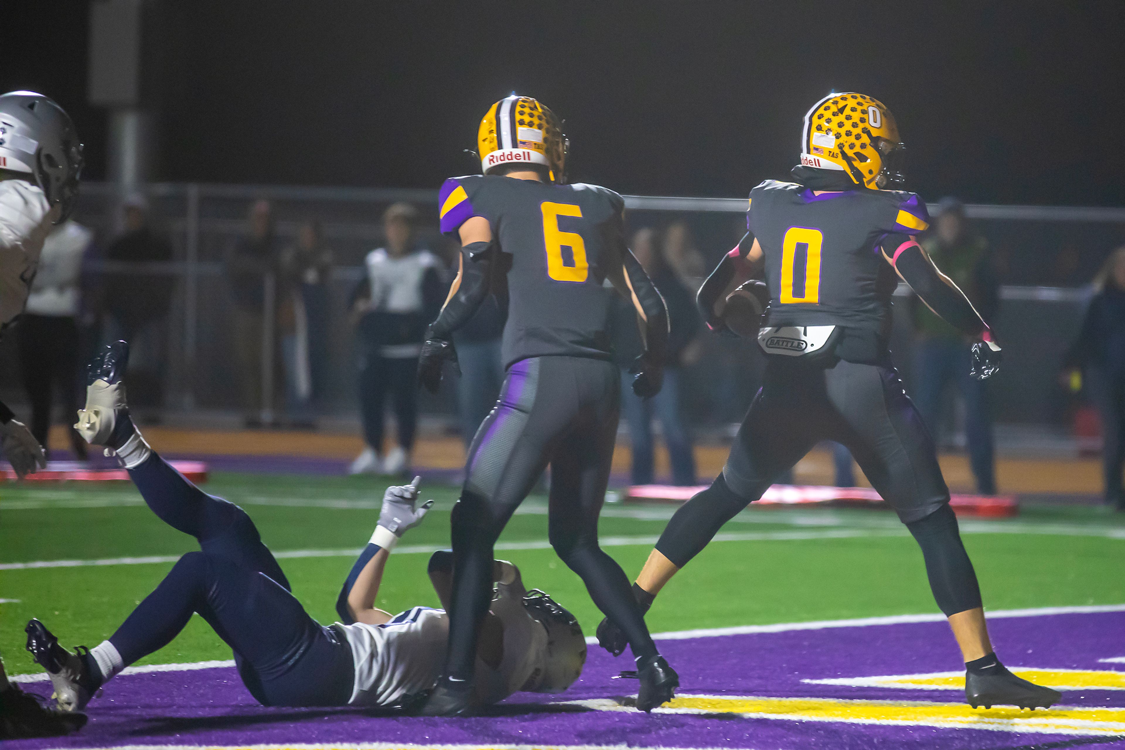 Lewiston tight end Cole Arlint scores a touchdown against Lake City in a nonconference game Friday at Lewiston High School.,