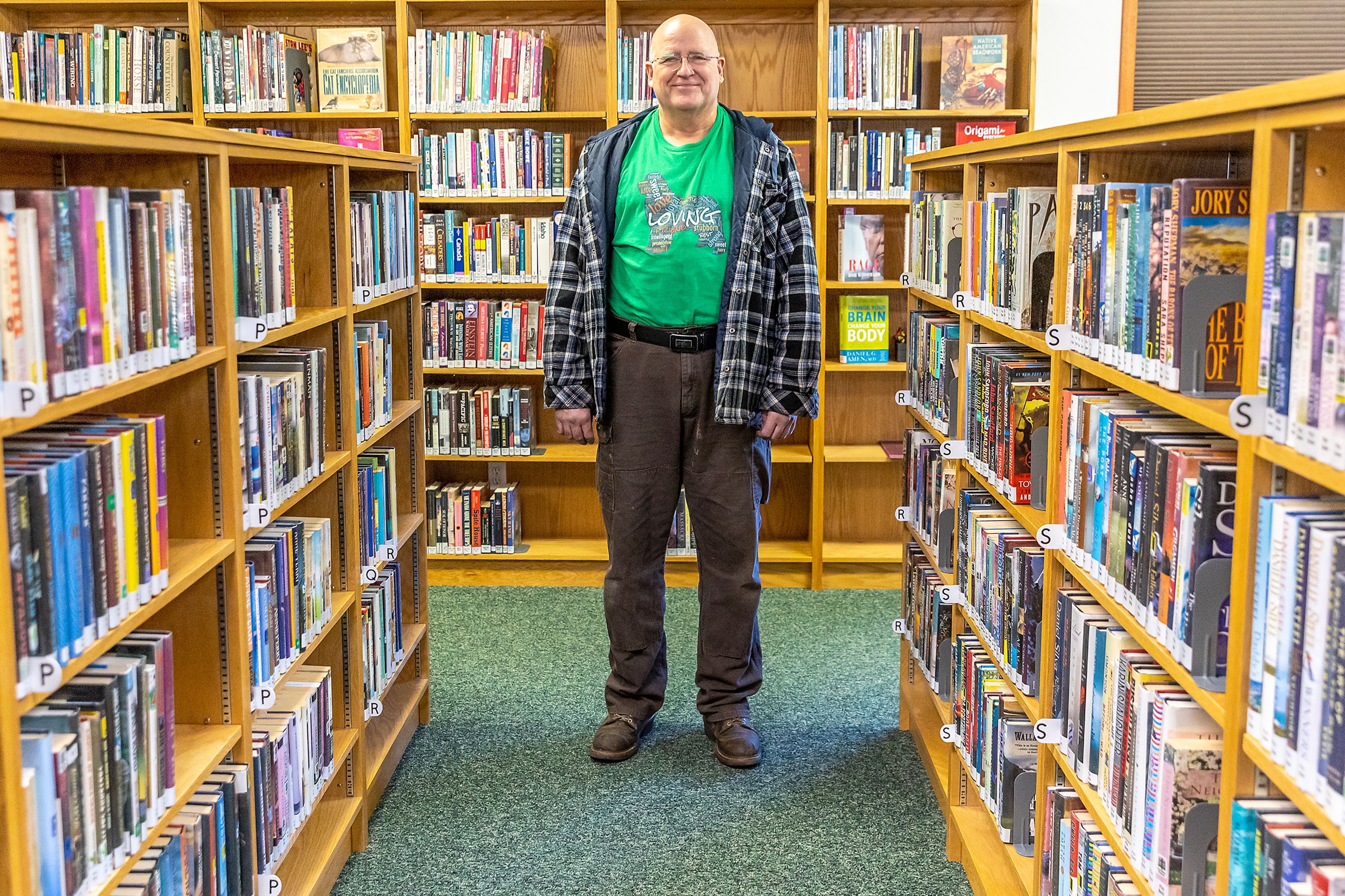 Mike Davisson stands for a photo at the Winchester Community Library Thursday in Winchester.