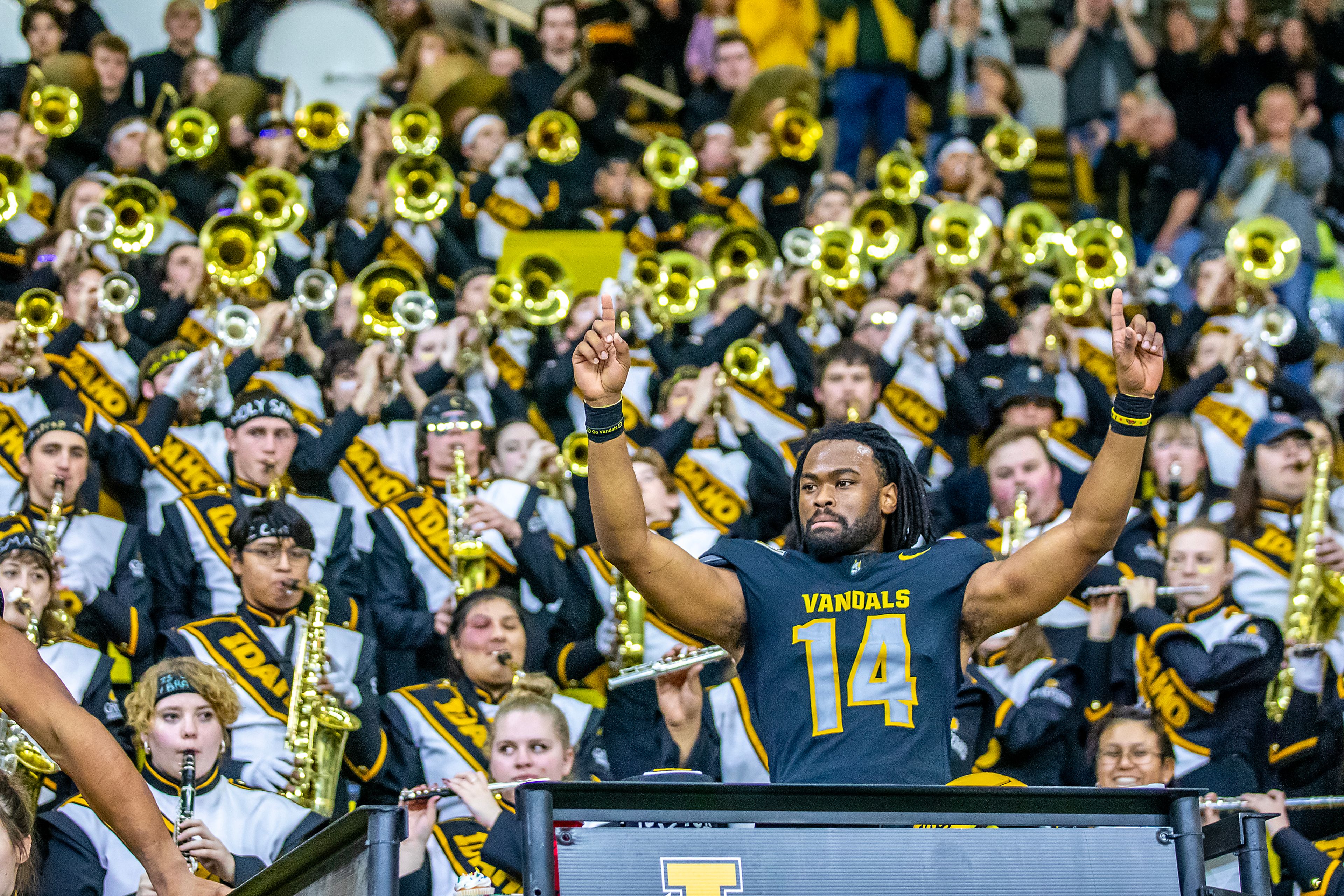 Idaho defensive back Kyrin Beachem celebrates as the band plays behind him following the Vandals 31-24 victory over Weber State in a Big Sky conference game Saturday at the P1FCU Kibbie Dome in Moscow.