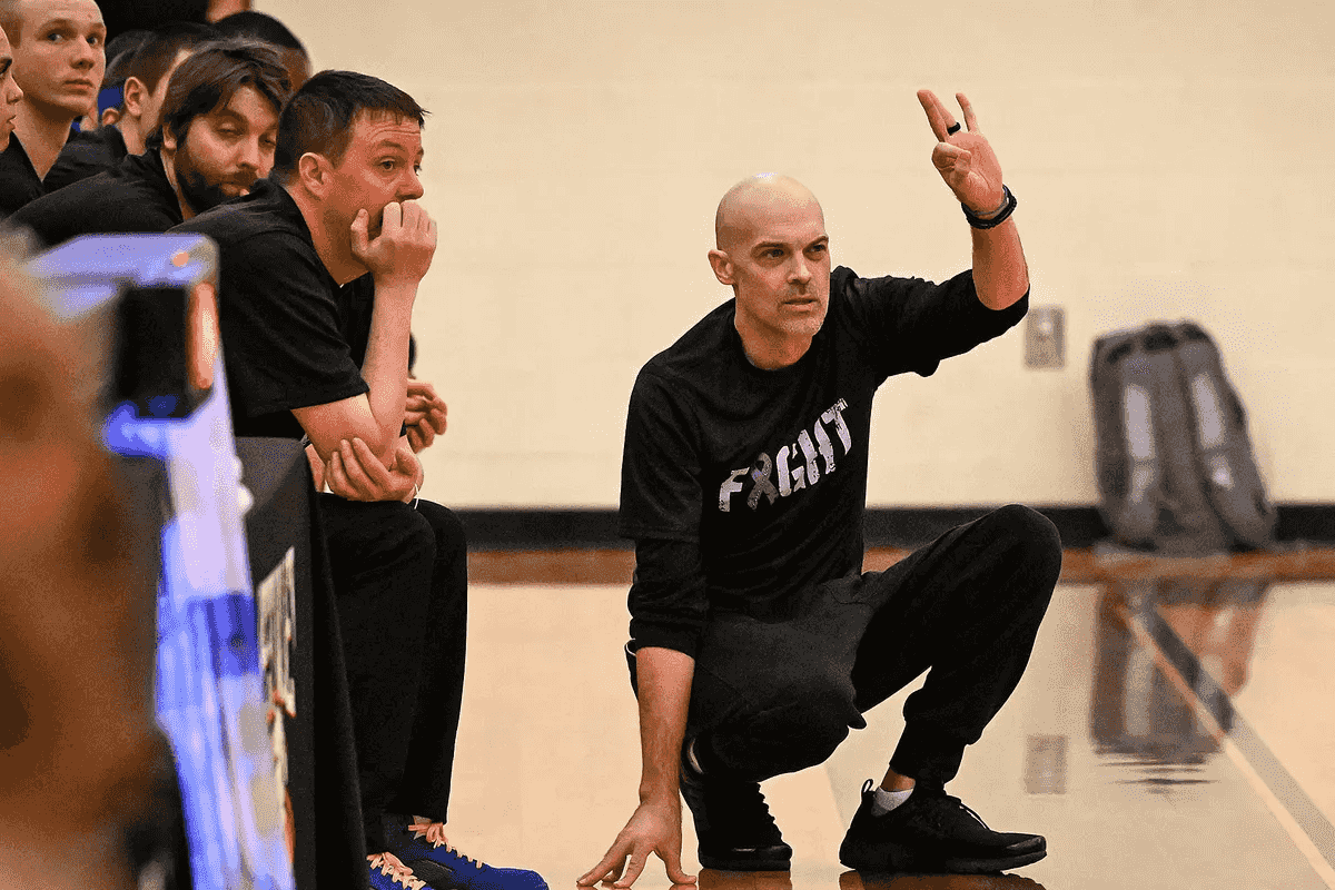 Reece Jenkin, boys basketball coach at Colfax High School, d...