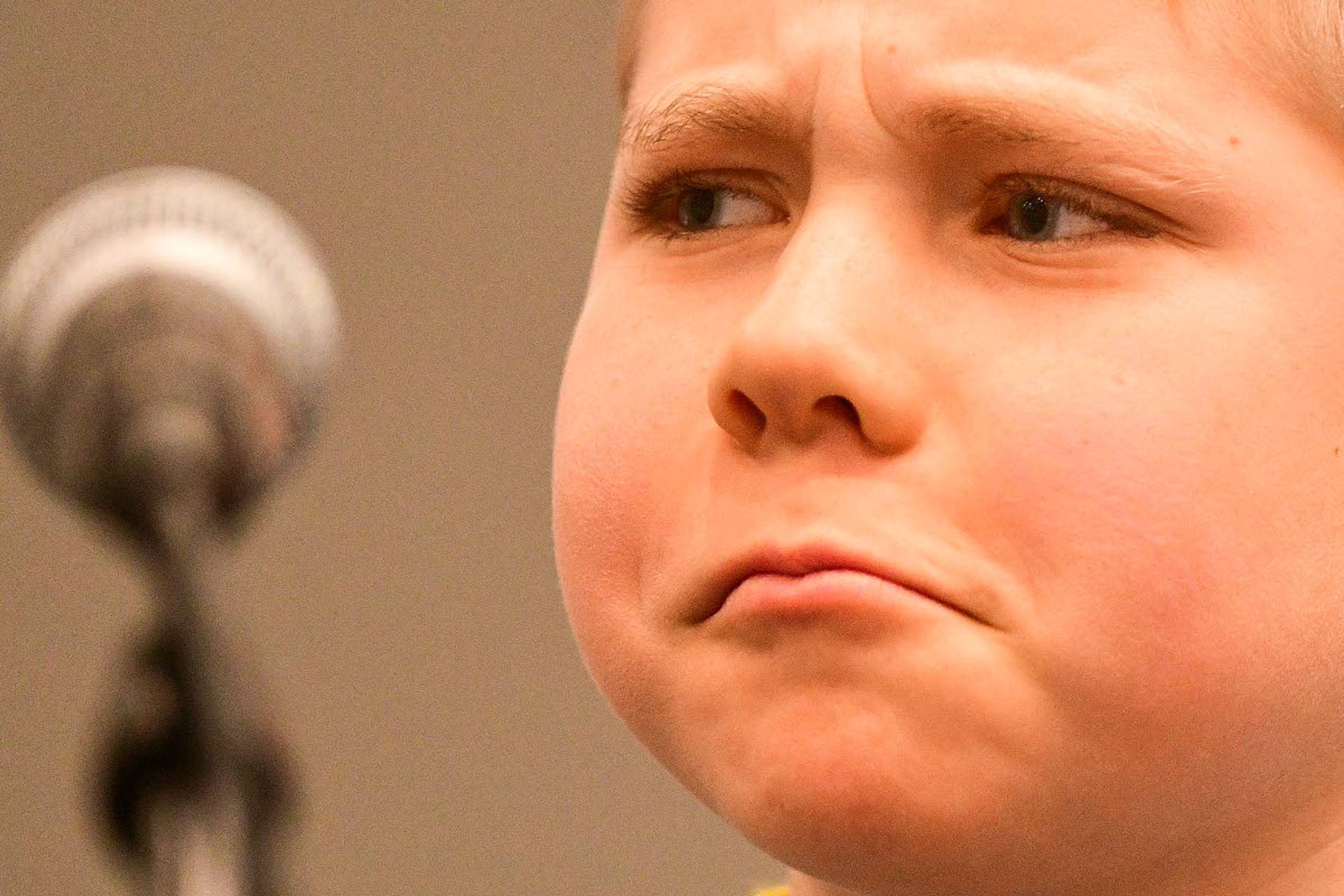 Blake Dobbins, a fifth-grader from Sunnyside Elementary in Pullman, grimaces after being given the word “Frankenstein” to spell during the spelling bee Saturday in Lewiston.