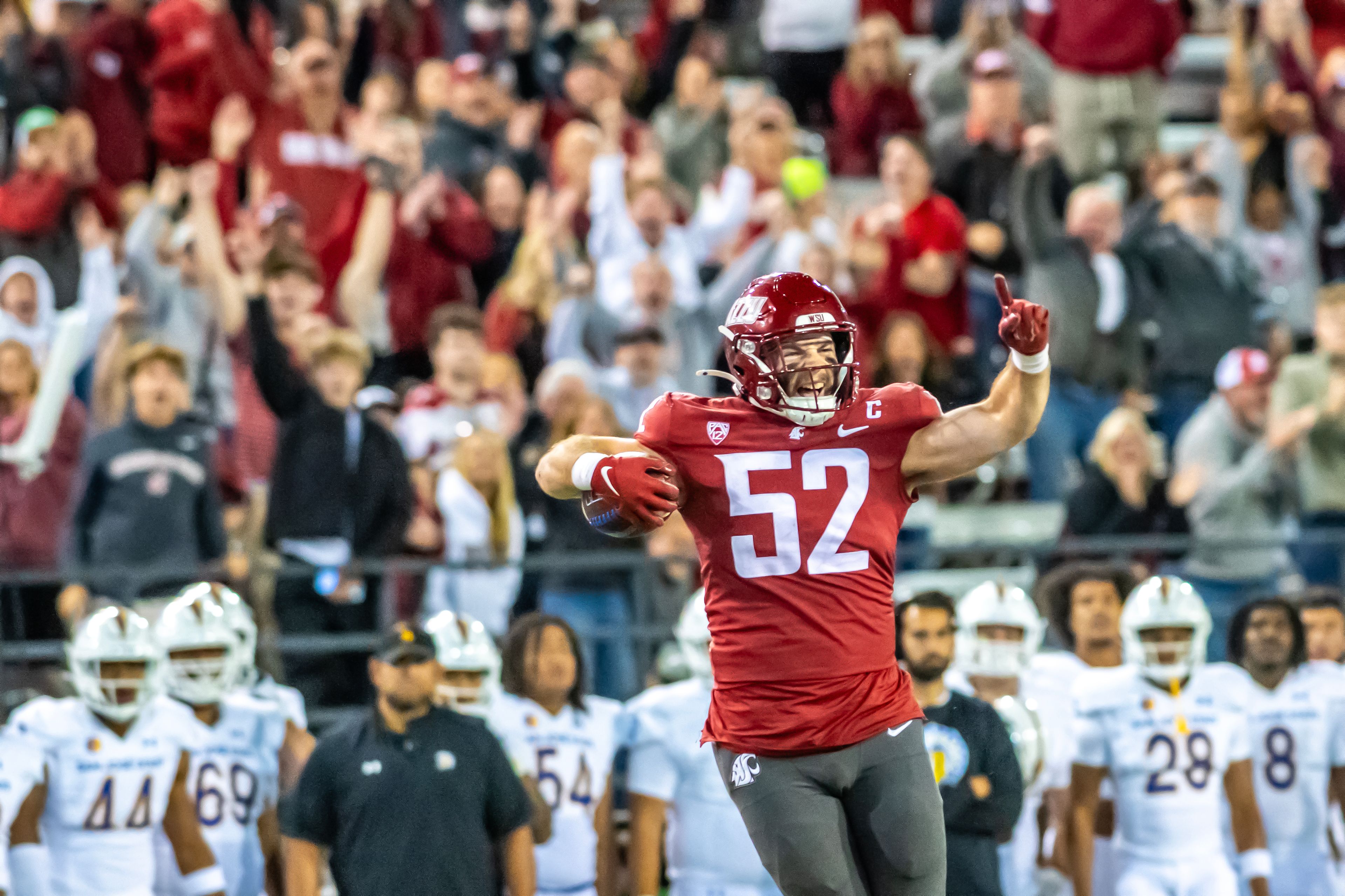 Washington State linebacker Kyle Thornton  celebrates an interception against San Jose State during a quarter of a game Friday at Gesa Field in Pullman.