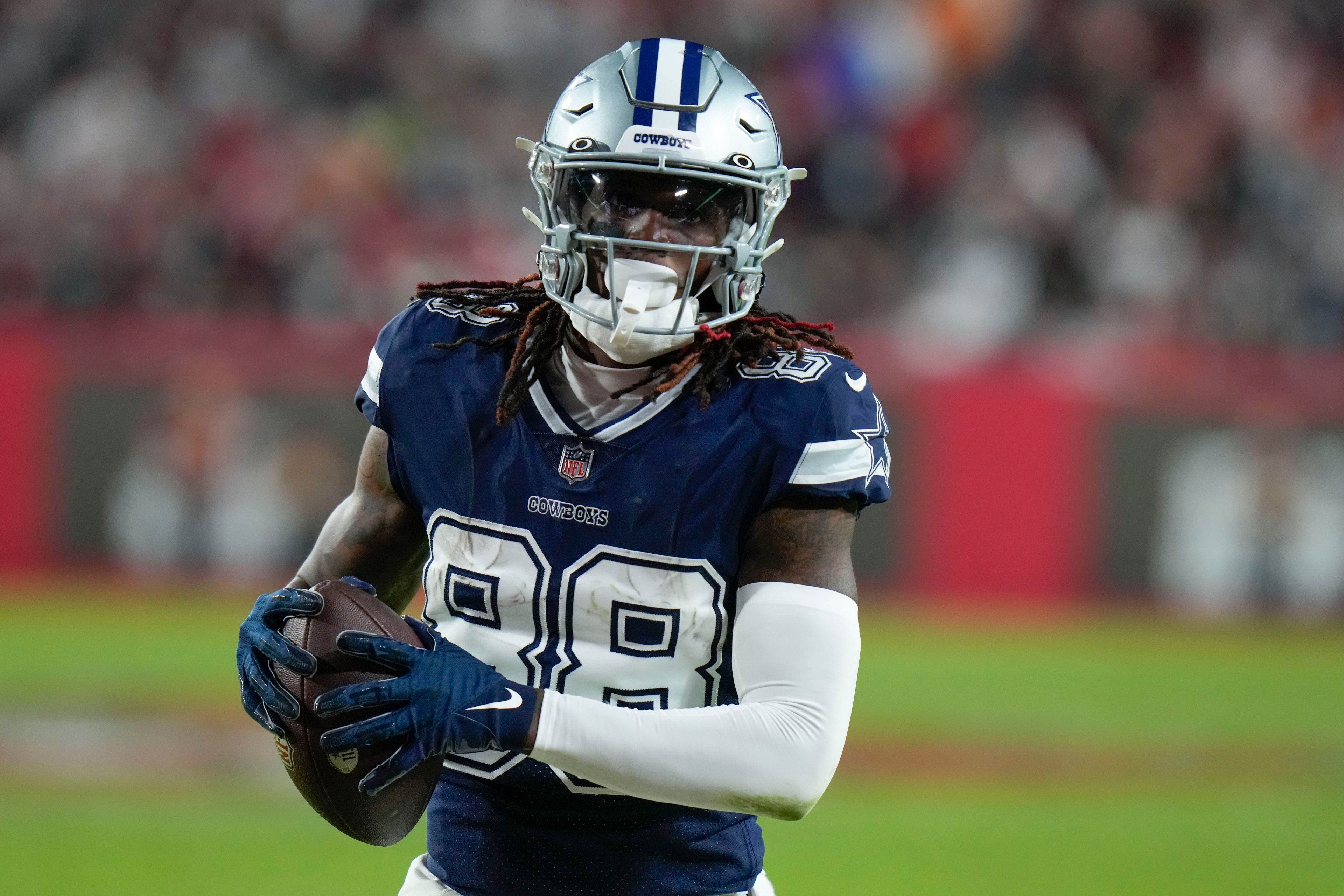 Dallas Cowboys wide receiver CeeDee Lamb (88) runs into the end zone for a touchdown against the Tampa Bay Buccaneers during the second half of an NFL wild-card football game, Monday, Jan. 16, 2023, in Tampa, Fla. (AP Photo/Chris O'Meara)