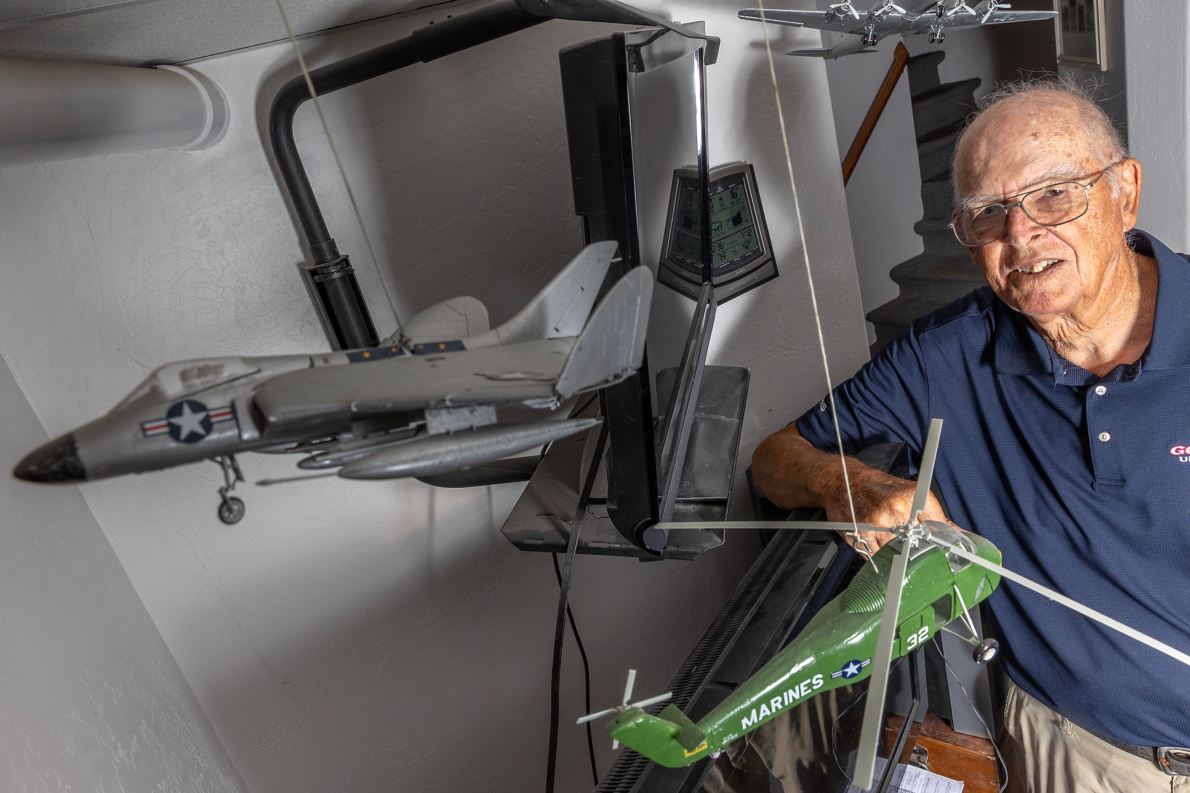 Ken McLaughlin is pictured behind several model aircrafts Thursday, July 13, at his home in Clarkston.