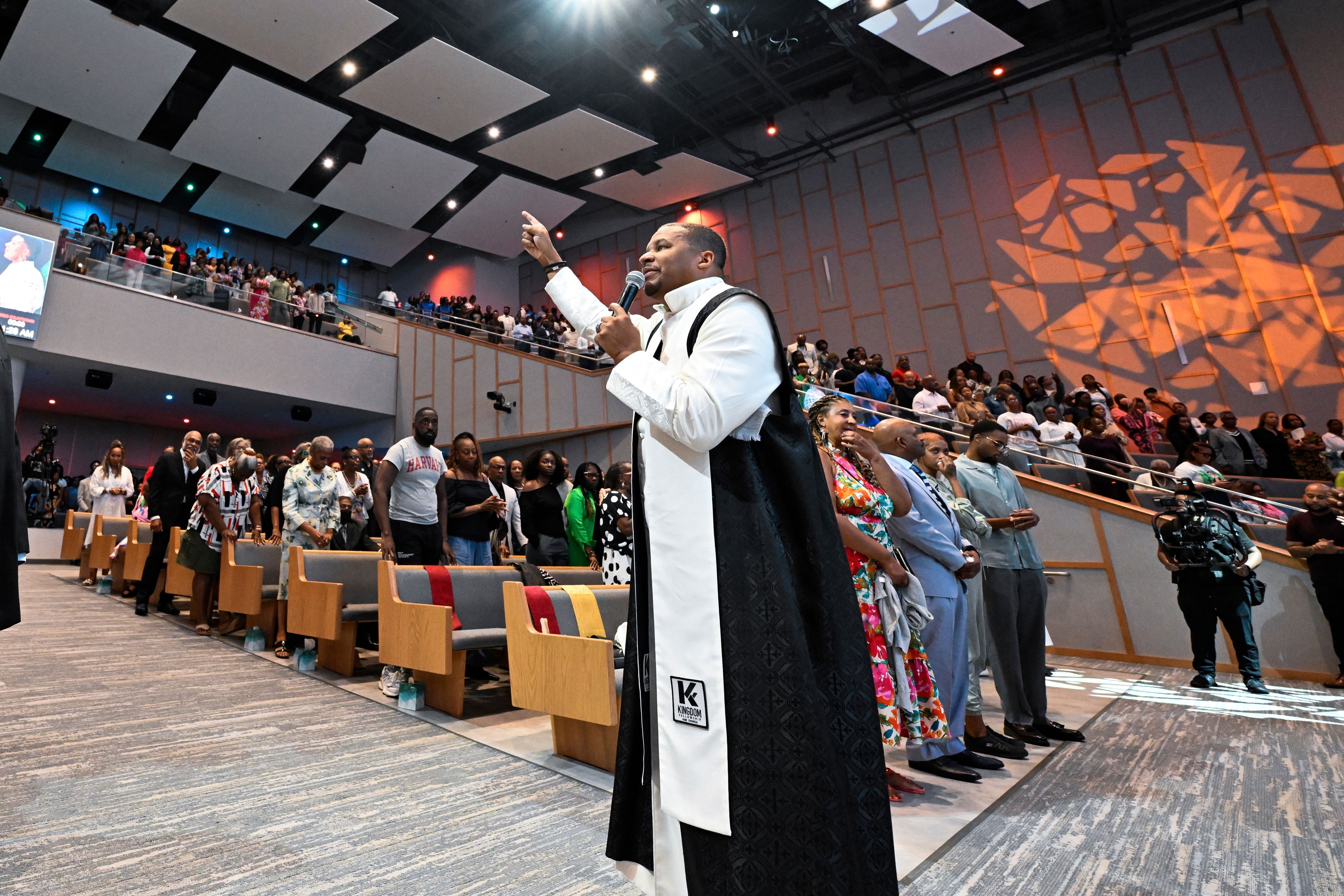 Reverend Matthew L. Watley delivers the benediction during Sunday service at Kingdom Fellowship AME Church, Sunday, June 2, 2024, in Calverton, Md. The suburban Maryland congregation, led by Rev. Watley, has landed at the top of a list of the fastest-growing churches in America.