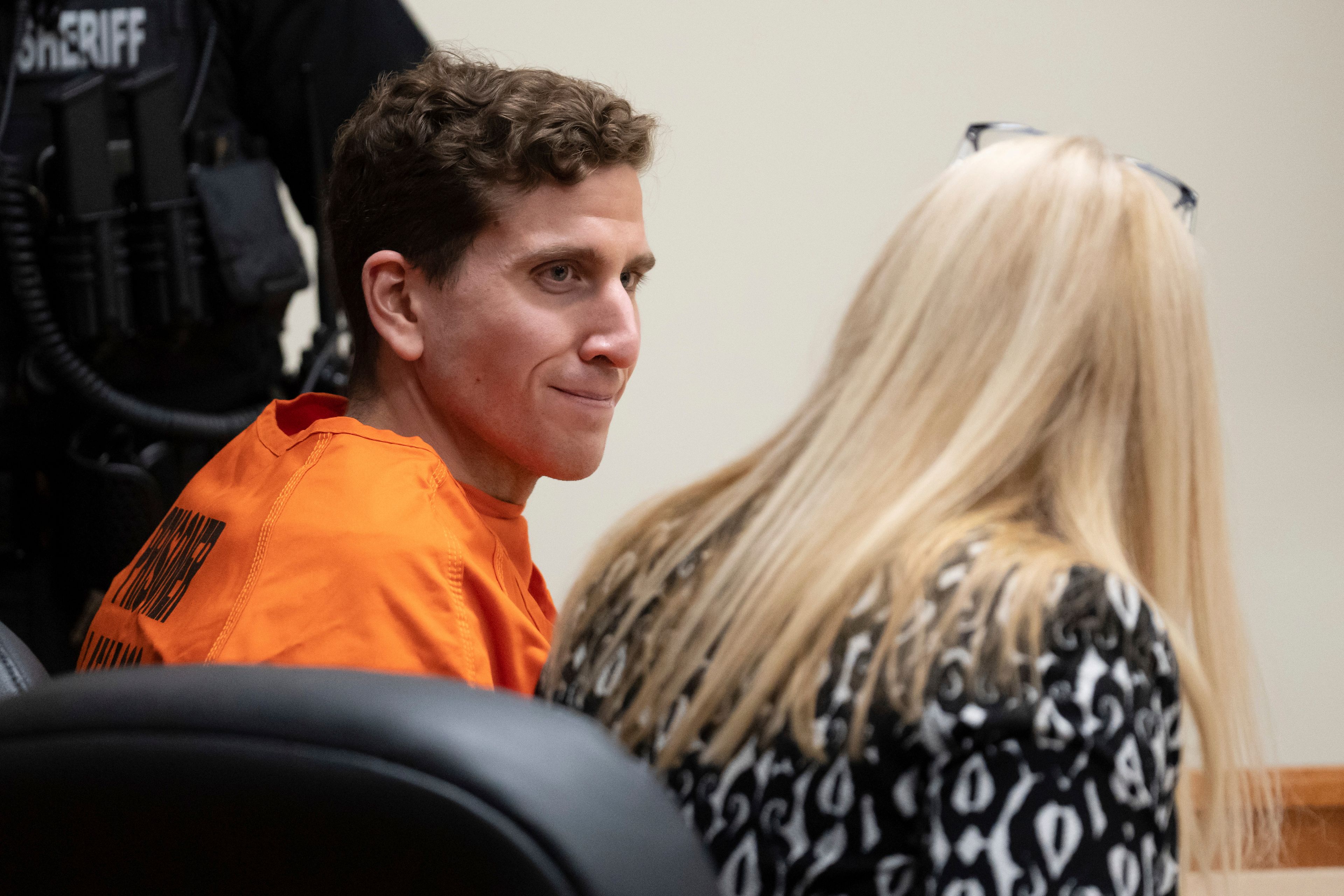 Bryan Kohberger, left, who is accused of killing four University of Idaho students in November 2022, looks toward his attorney, public defender Anne Taylor, right, during a hearing in Latah County District Court, Thursday, Jan. 5, 2023, in Moscow, Idaho. (AP Photo/Ted S. Warren, Pool)