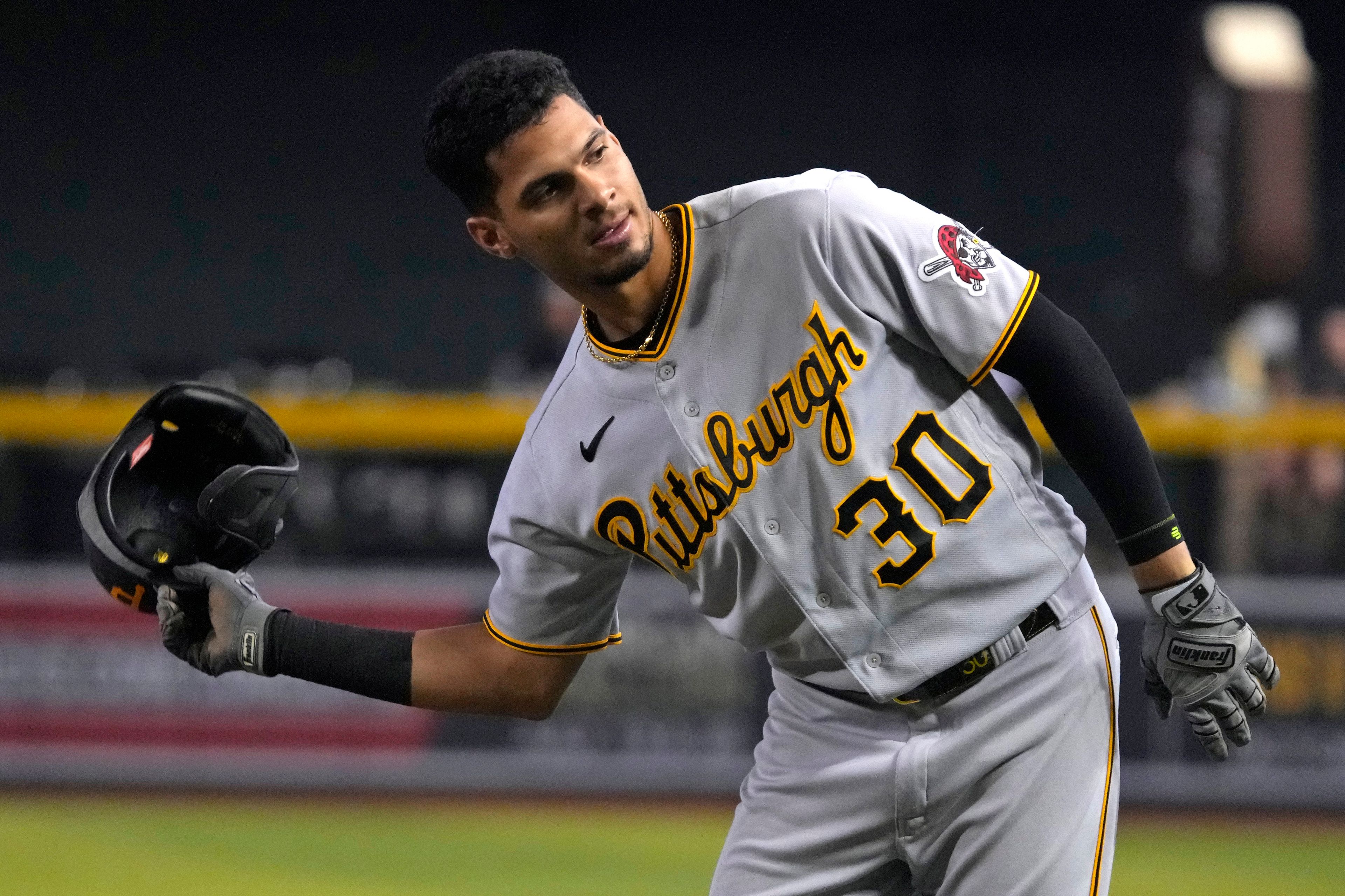 FILE - Pittsburgh Pirates shortstop Tucupita Marcano (30) in the first inning during a baseball game against the Arizona Diamondbacks, Saturday, July 8, 2023, in Phoenix. Major League Baseball has permanently banned Marcano Tuesday, June 4, 2024, for betting on baseball and suspended the four other players for one year after finding the players placed unrelated bets with a legal sportsbook.